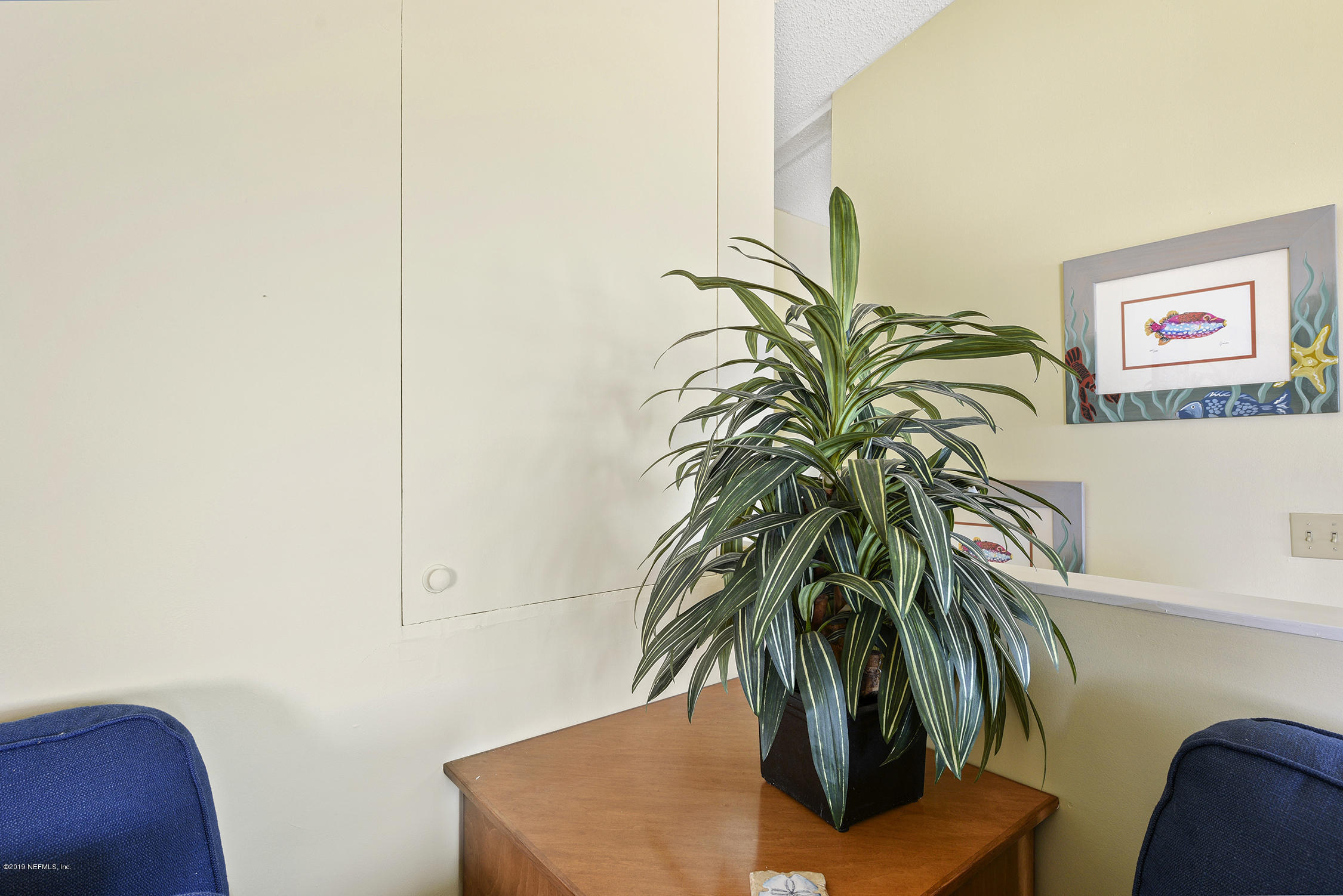 8850 Old A1A, Unit 9 St. Augustine, FL 32080 - Photo 18 of 37 a view of potted plants in front of a house