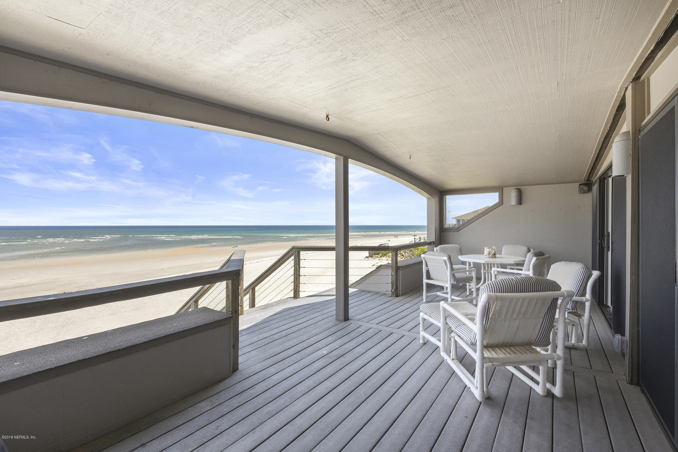 8850 Old A1A, Unit 9 St. Augustine, FL 32080 - Photo 2 of 37 a dining room with furniture and wooden floor