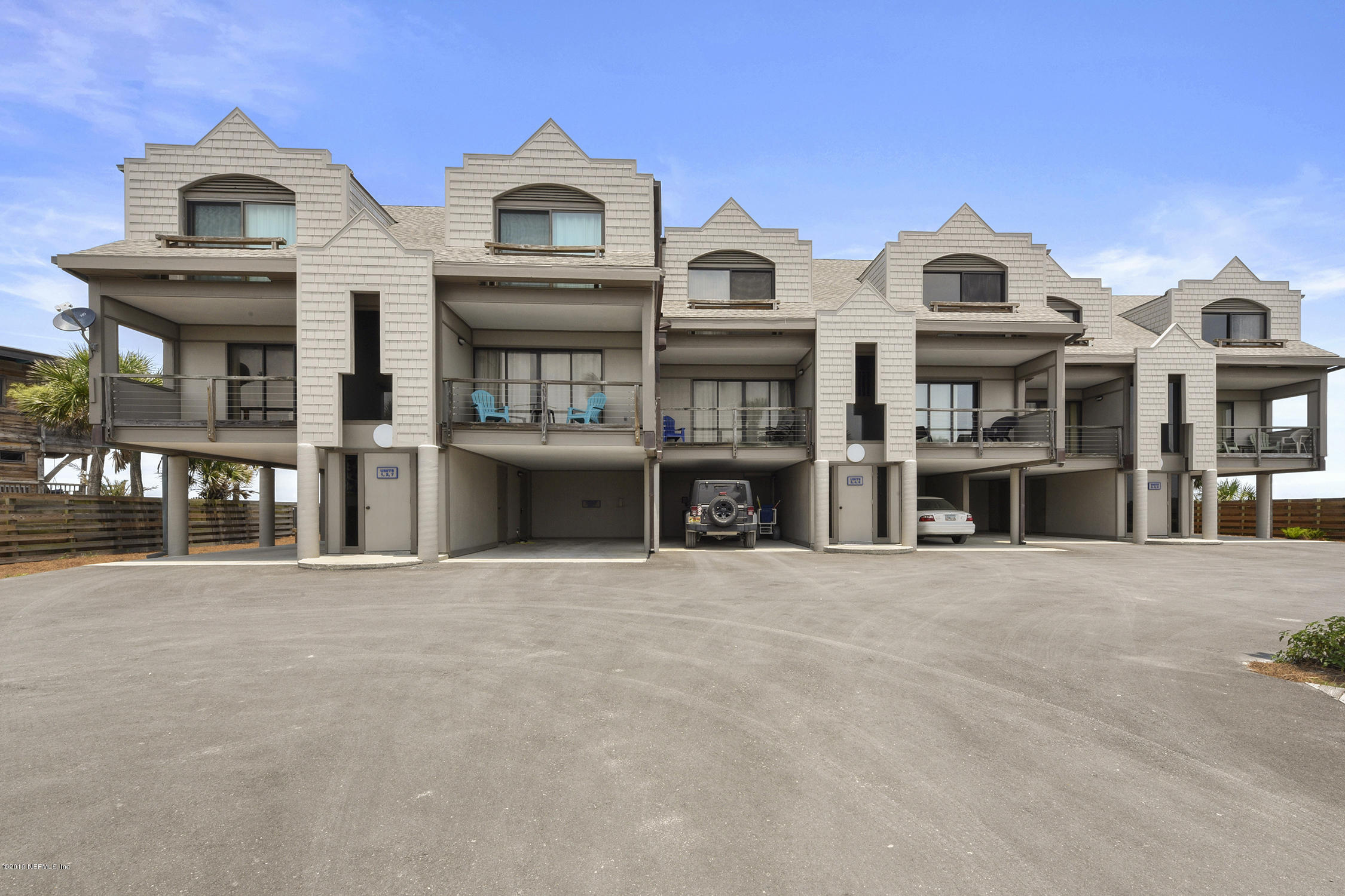 8850 Old A1A, Unit 9 St. Augustine, FL 32080 - Photo 29 of 37 a view of multiple houses with a street