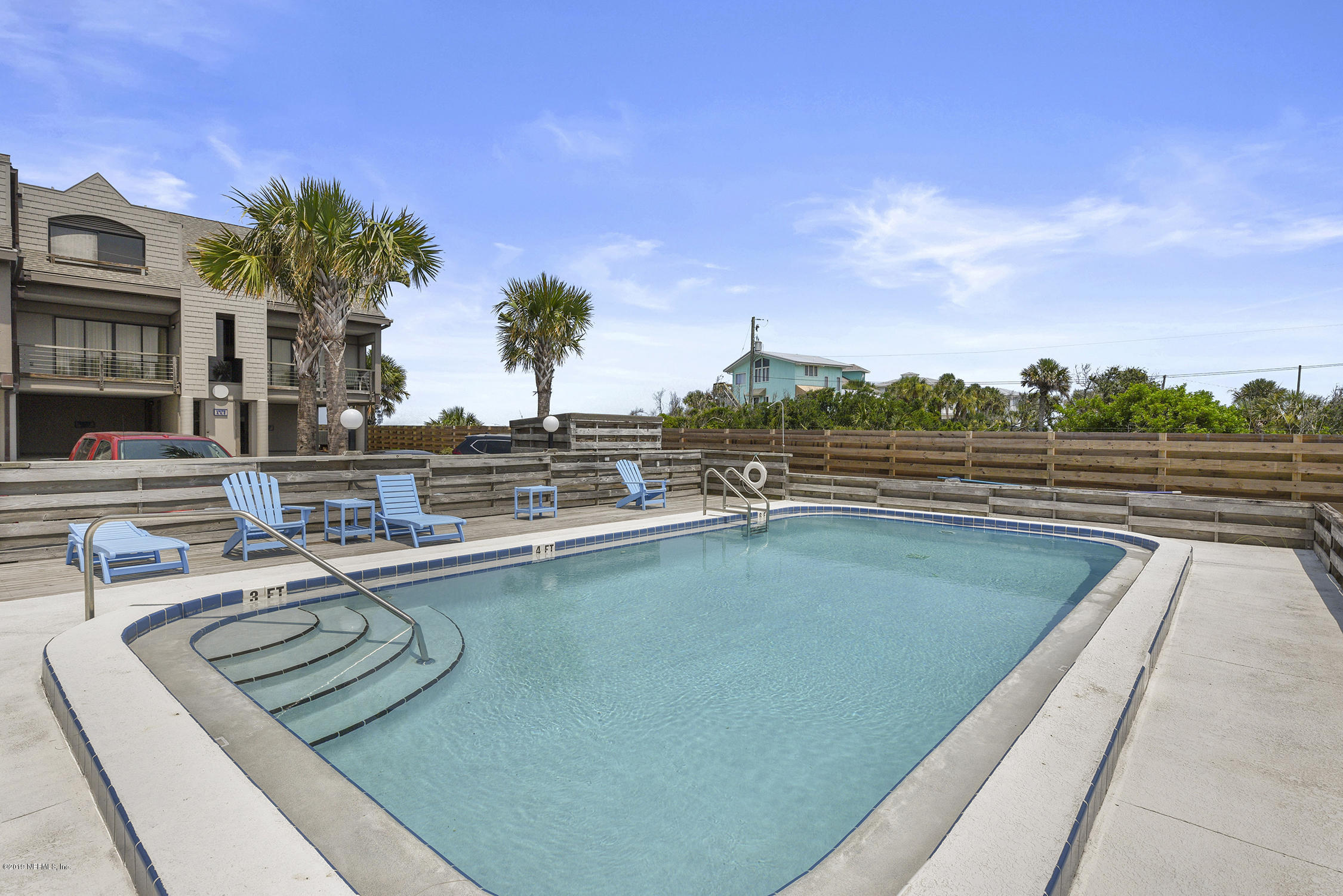 8850 Old A1A, Unit 9 St. Augustine, FL 32080 - Photo 33 of 37 a view of swimming pool with outdoor seating and plants