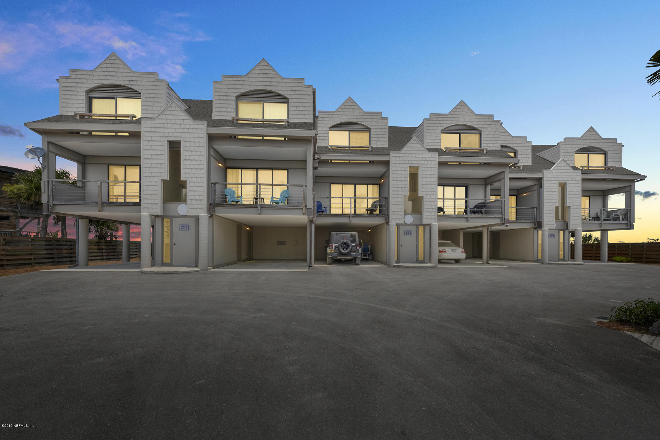 8850 Old A1A, Unit 9 St. Augustine, FL 32080 - Photo 9 of 37 a view of a large building with a clock on the wall