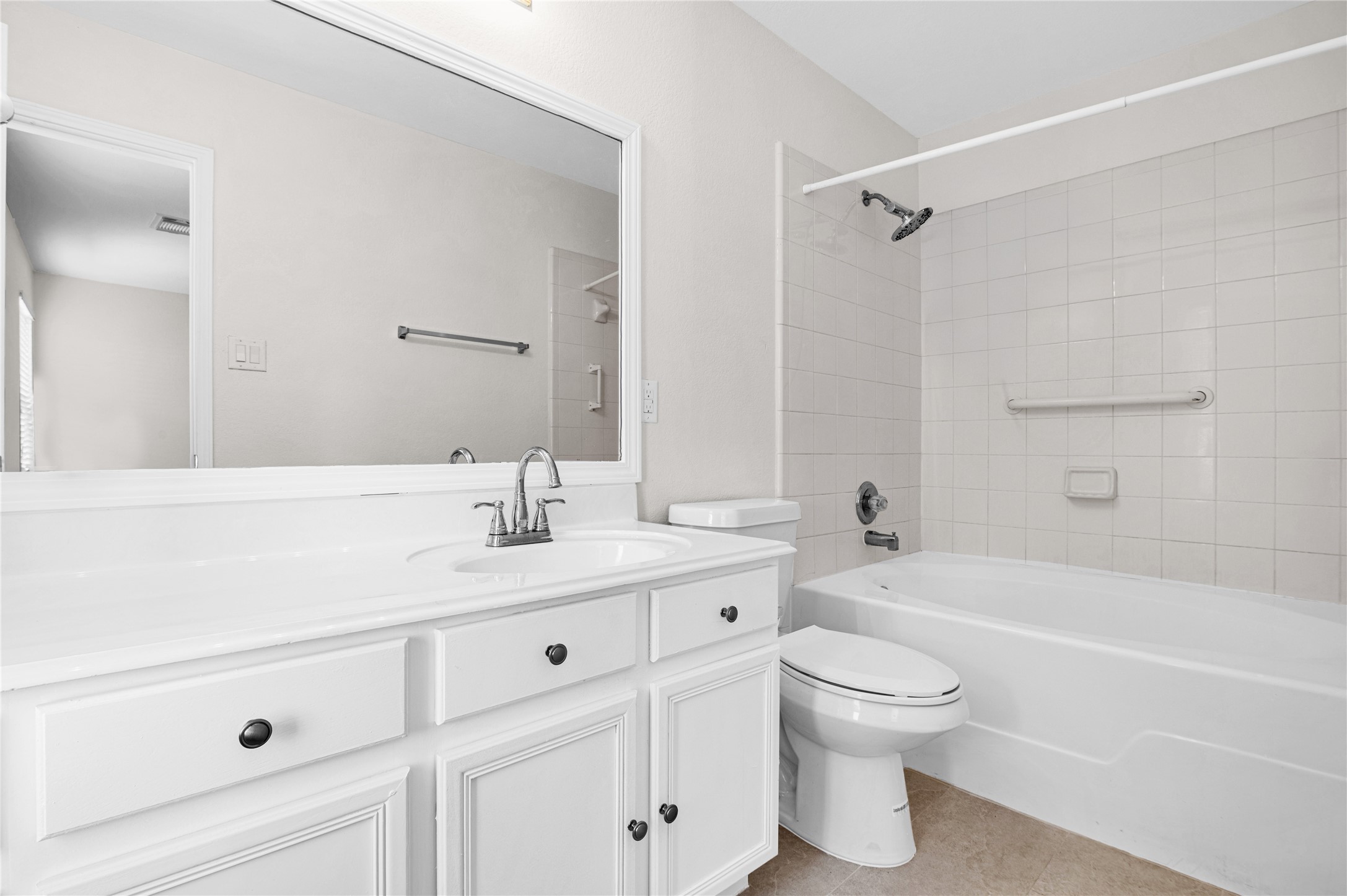 29514 North Legends Bend Drive Spring, TX 77386 - Photo 12 of 19 The primary bathroom features a well-appointed vanity with ample counter space, offering both style and everyday functionality.