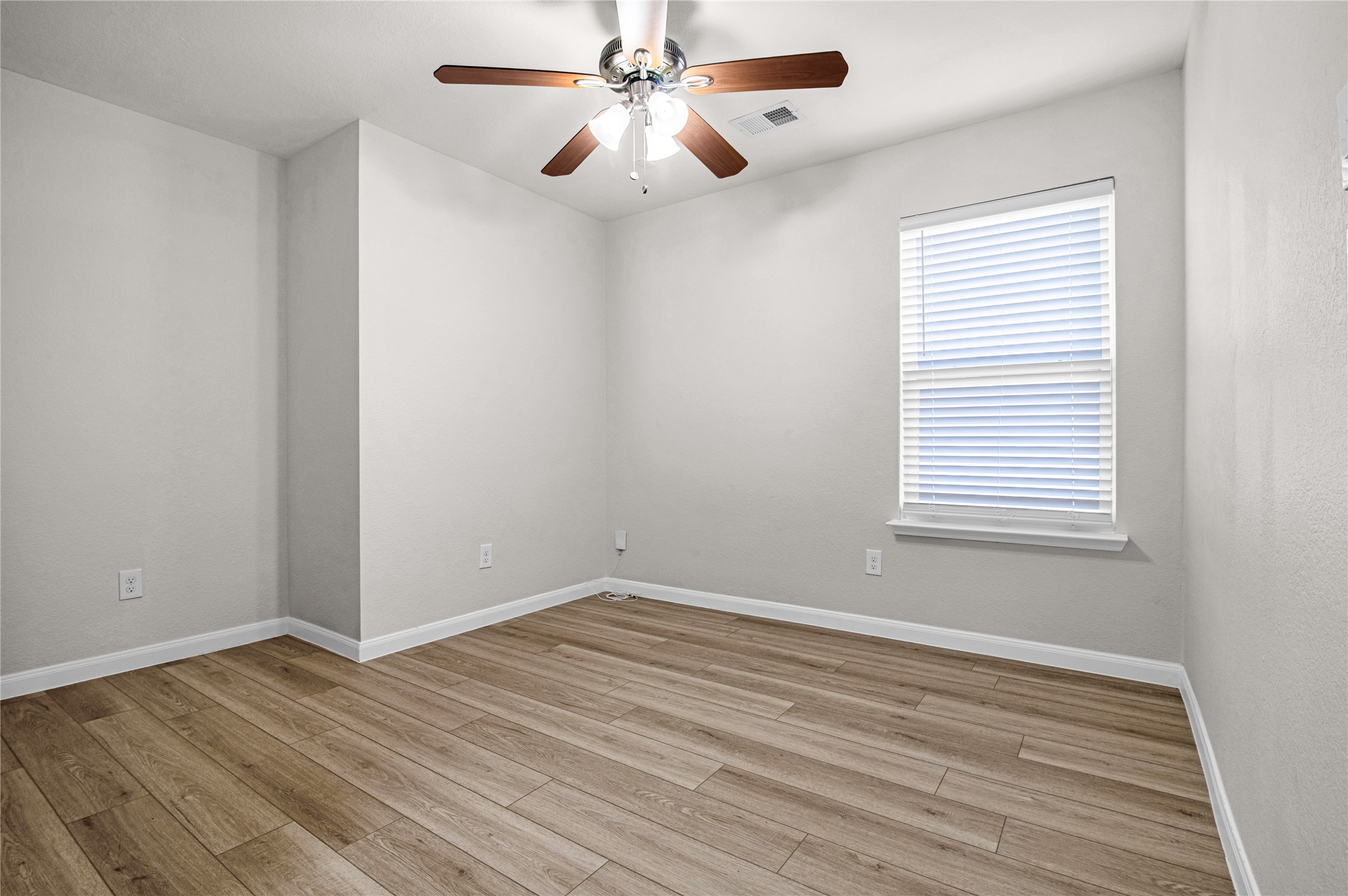 29514 North Legends Bend Drive Spring, TX 77386 - Photo 9 of 19 A versatile home office offers flexibility to easily convert into a fourth bedroom, guest space, or playroom to fit your needs.