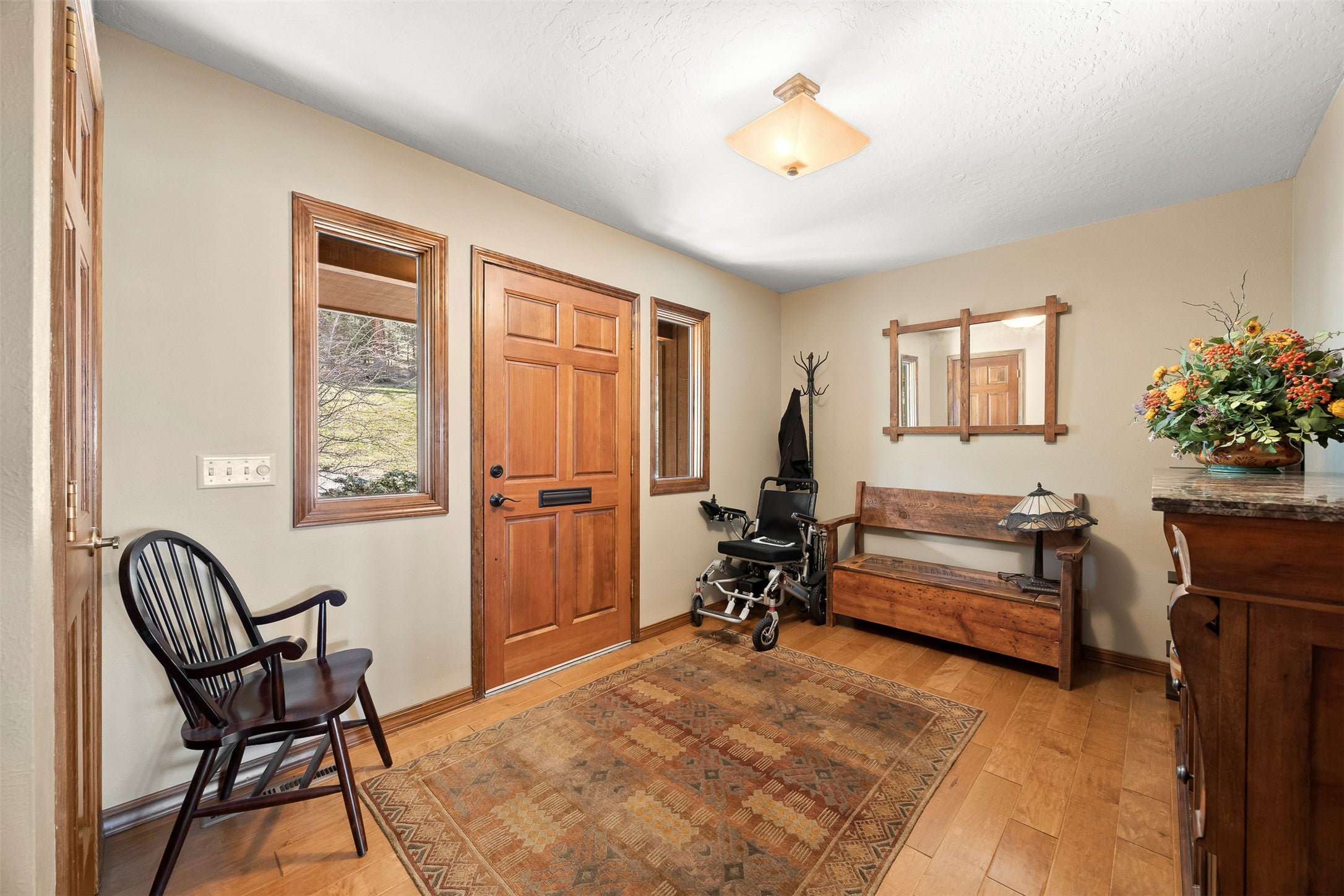 730 Big Flat Road Missoula, MT 59804 - Photo 22 of 59 Entryway featuring light wood-style floors and baseboards