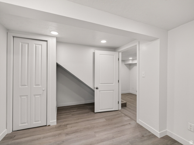 74 South 300 East Springville, UT 84663 - Photo 23 of 48 Light wood-finish flooring throughout, complemented by white walls and trim