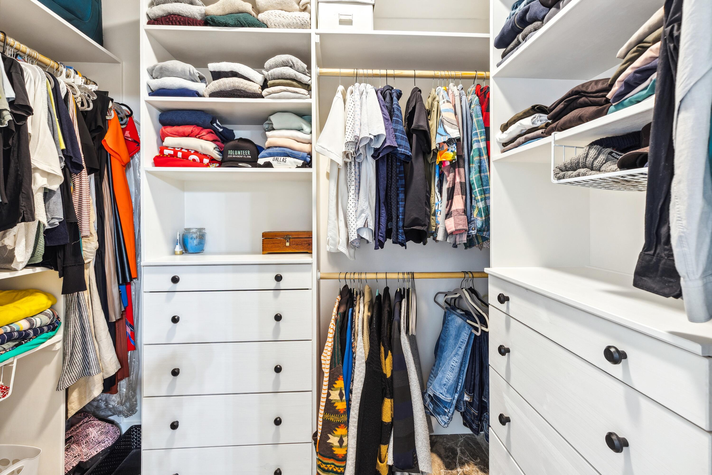 209 Forest Park Drive Santa Rosa Beach, FL 32459 - Photo 20 of 49 a view of walk in closet with clothes and shoes