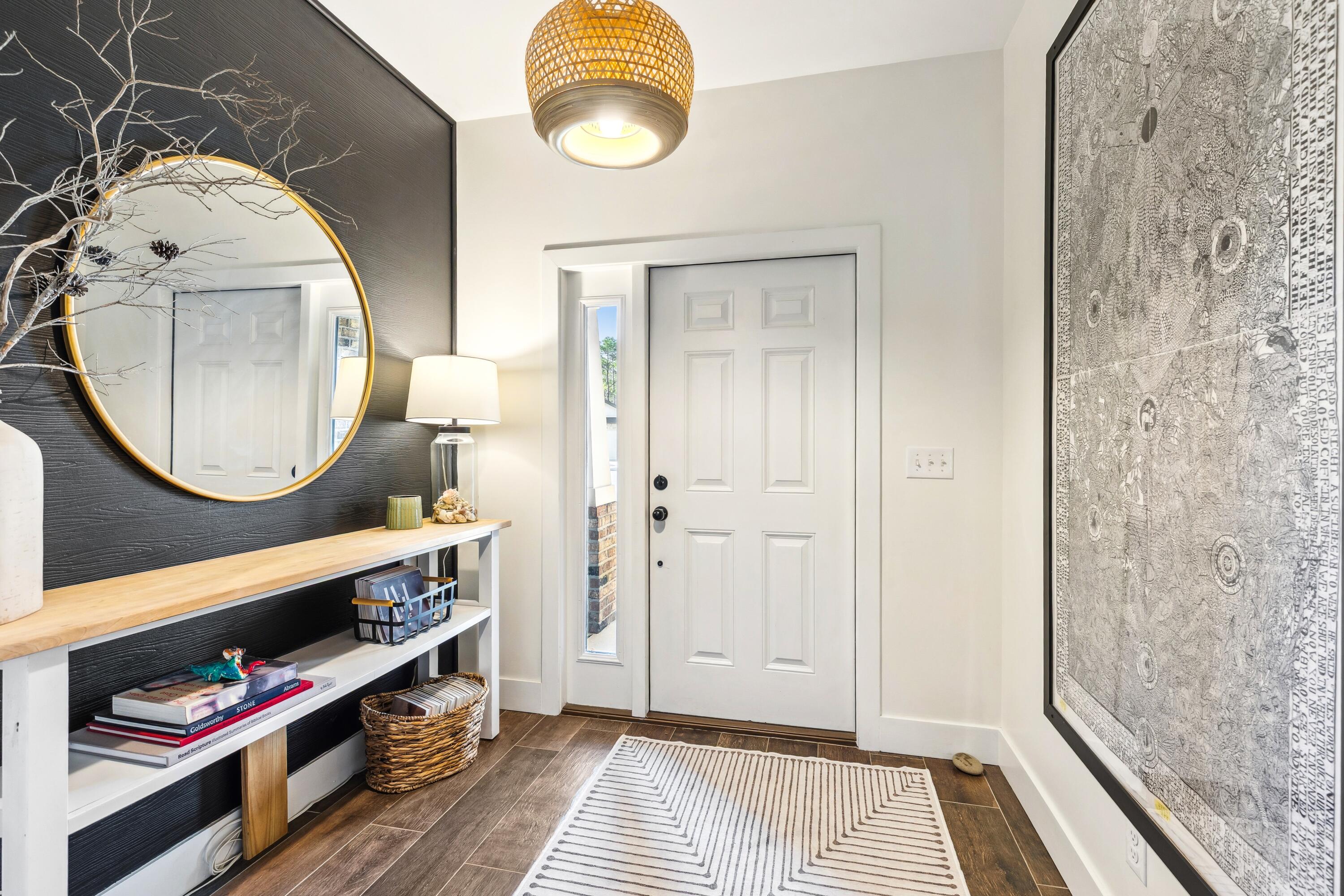 209 Forest Park Drive Santa Rosa Beach, FL 32459 - Photo 2 of 49 a view of a livingroom with furniture and wooden floor
