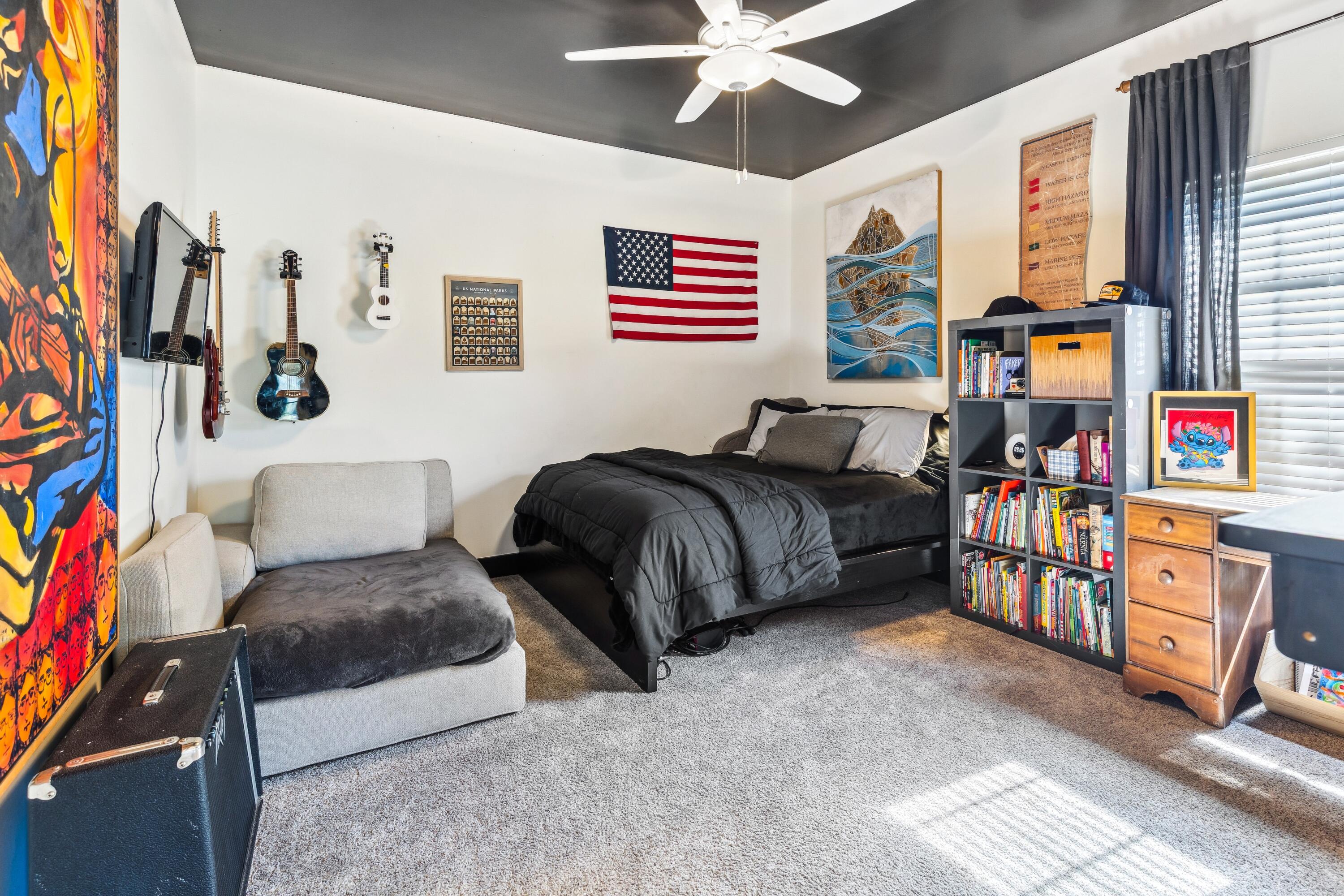 209 Forest Park Drive Santa Rosa Beach, FL 32459 - Photo 24 of 49 a bedroom with furniture and a book shelf