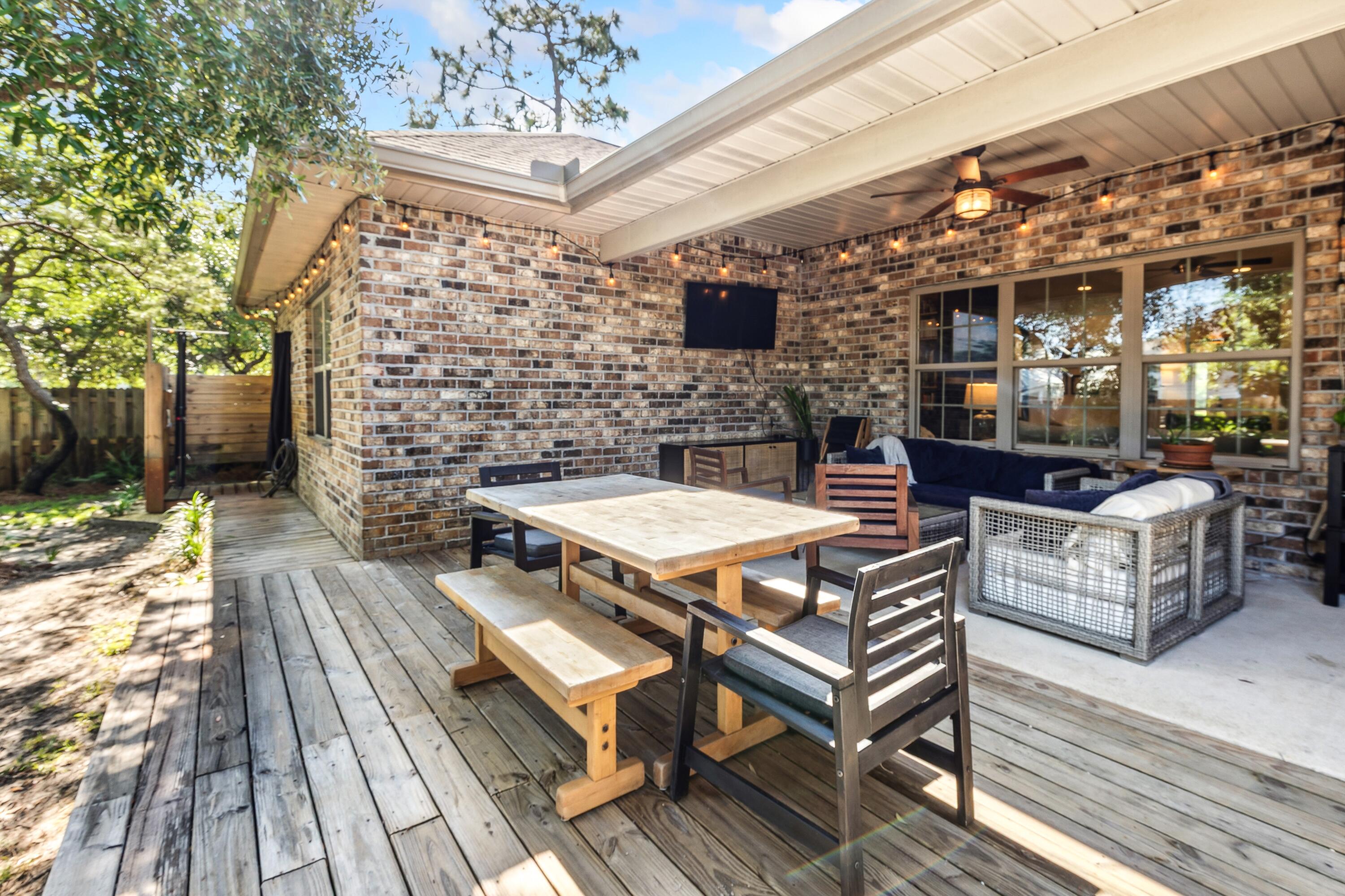 209 Forest Park Drive Santa Rosa Beach, FL 32459 - Photo 30 of 49 a outdoor space with lots of furniture
