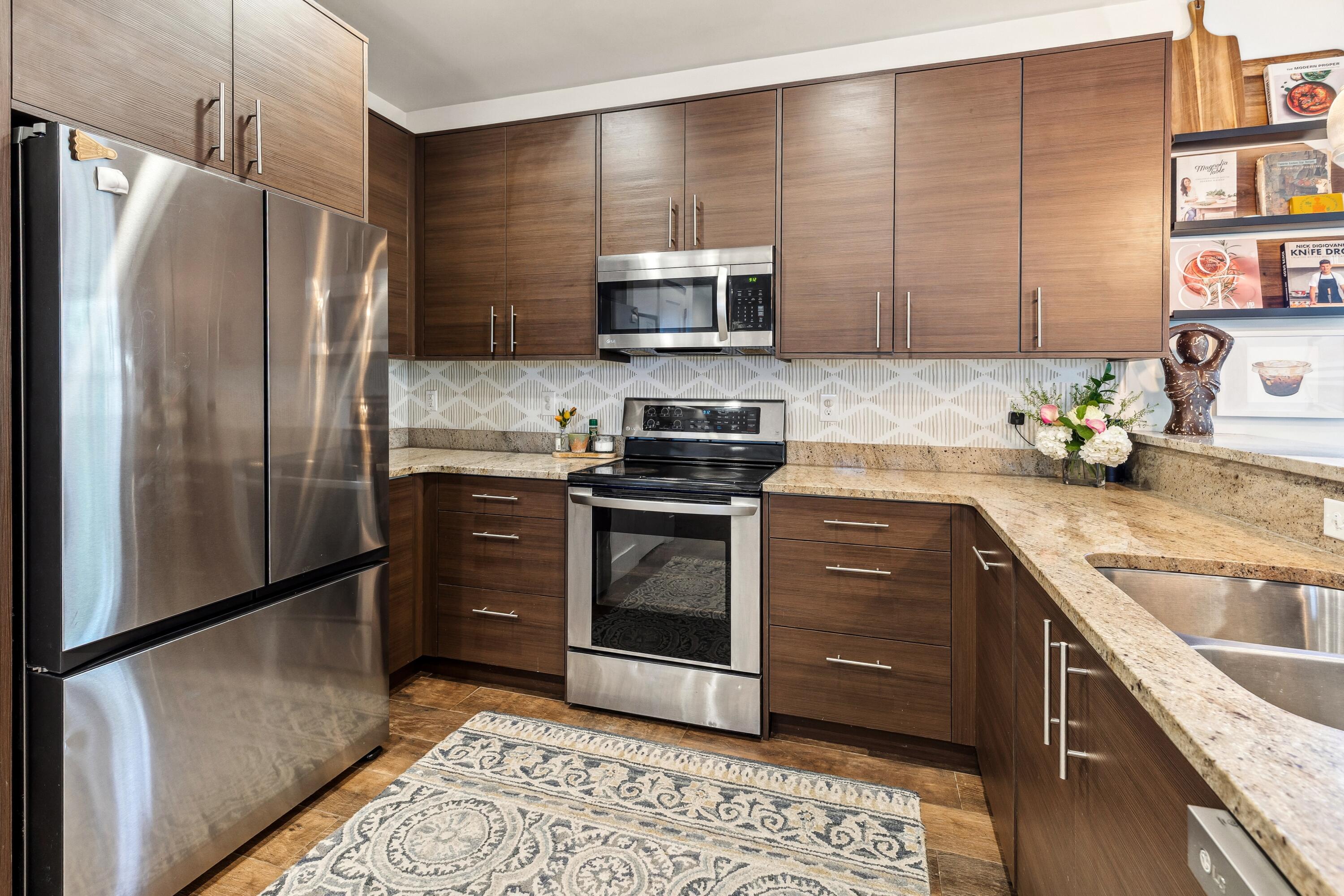 209 Forest Park Drive Santa Rosa Beach, FL 32459 - Photo 9 of 49 a kitchen with a sink stainless steel appliances and cabinets