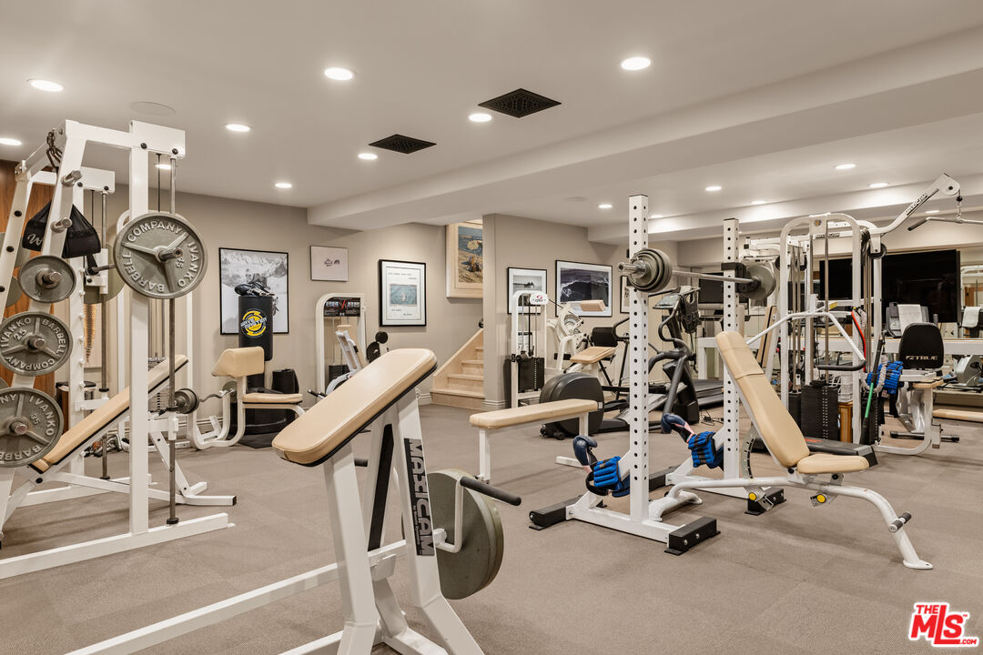 4009 Valley Meadow Road Encino, CA 91436 - Photo 17 of 32 a view of a room with gym equipment