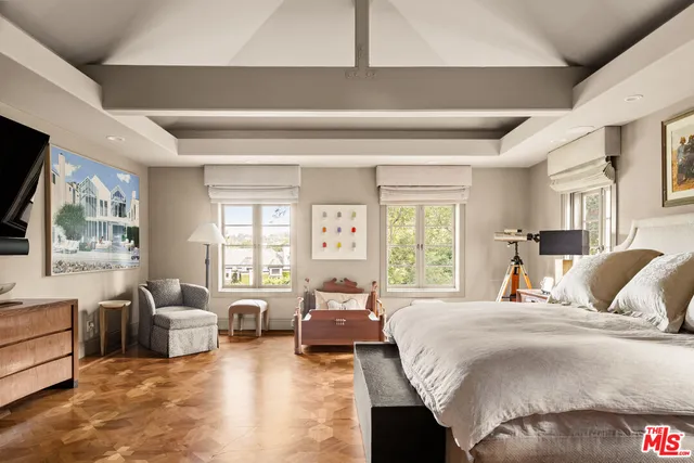 a living room with a couch and a window