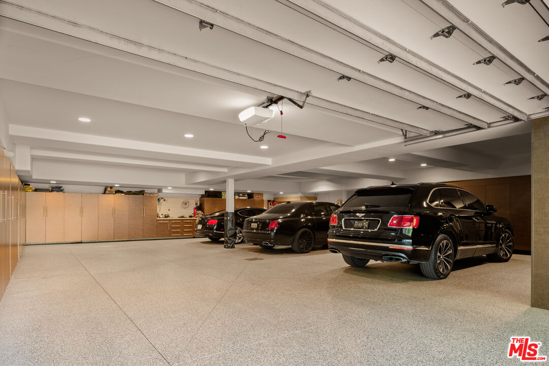 4009 Valley Meadow Road Encino, CA 91436 - Photo 28 of 32 a car parked in a garage
