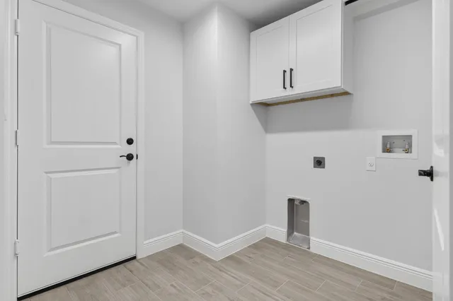 a view of cabinets and wooden floor