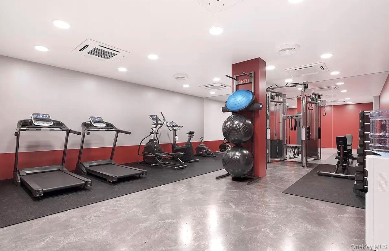 19-14 21st Road, Unit 2A Queens, NY 11105 - Photo 16 of 19 a view of a room with gym equipment