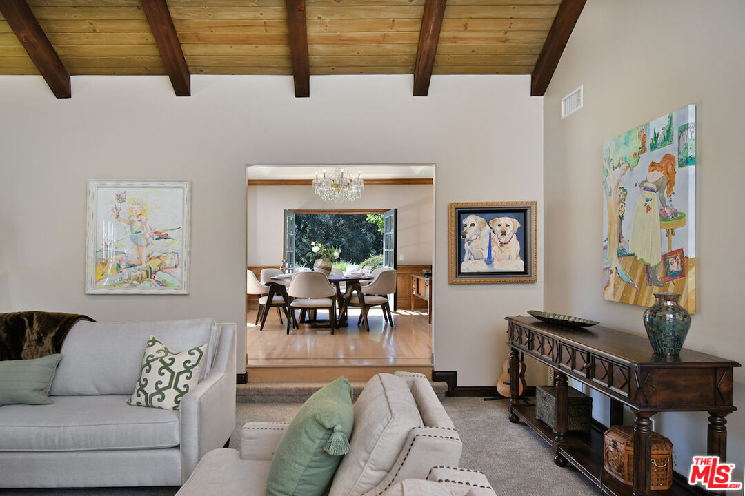 2317 Sierra Creek Road Agoura Hills, CA 91301 - Photo 15 of 73 a living room with furniture and a potted plant
