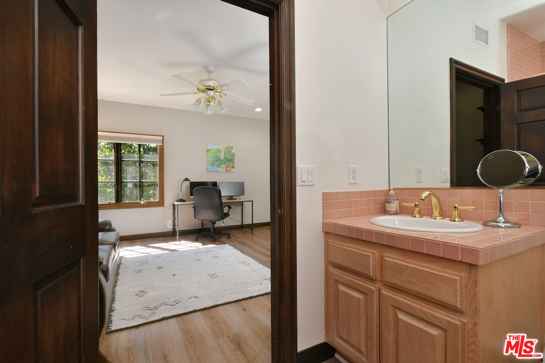 2317 Sierra Creek Road Agoura Hills, CA 91301 - Photo 30 of 73 a en suite bathroom with a sink double vanity
