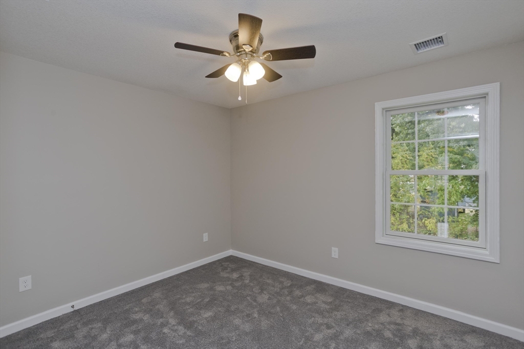 34 Chilson Street Springfield, MA 01118 - Photo 16 of 23 an empty room with a window