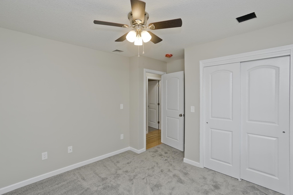 34 Chilson Street Springfield, MA 01118 - Photo 22 of 23 wooden floor in an empty room