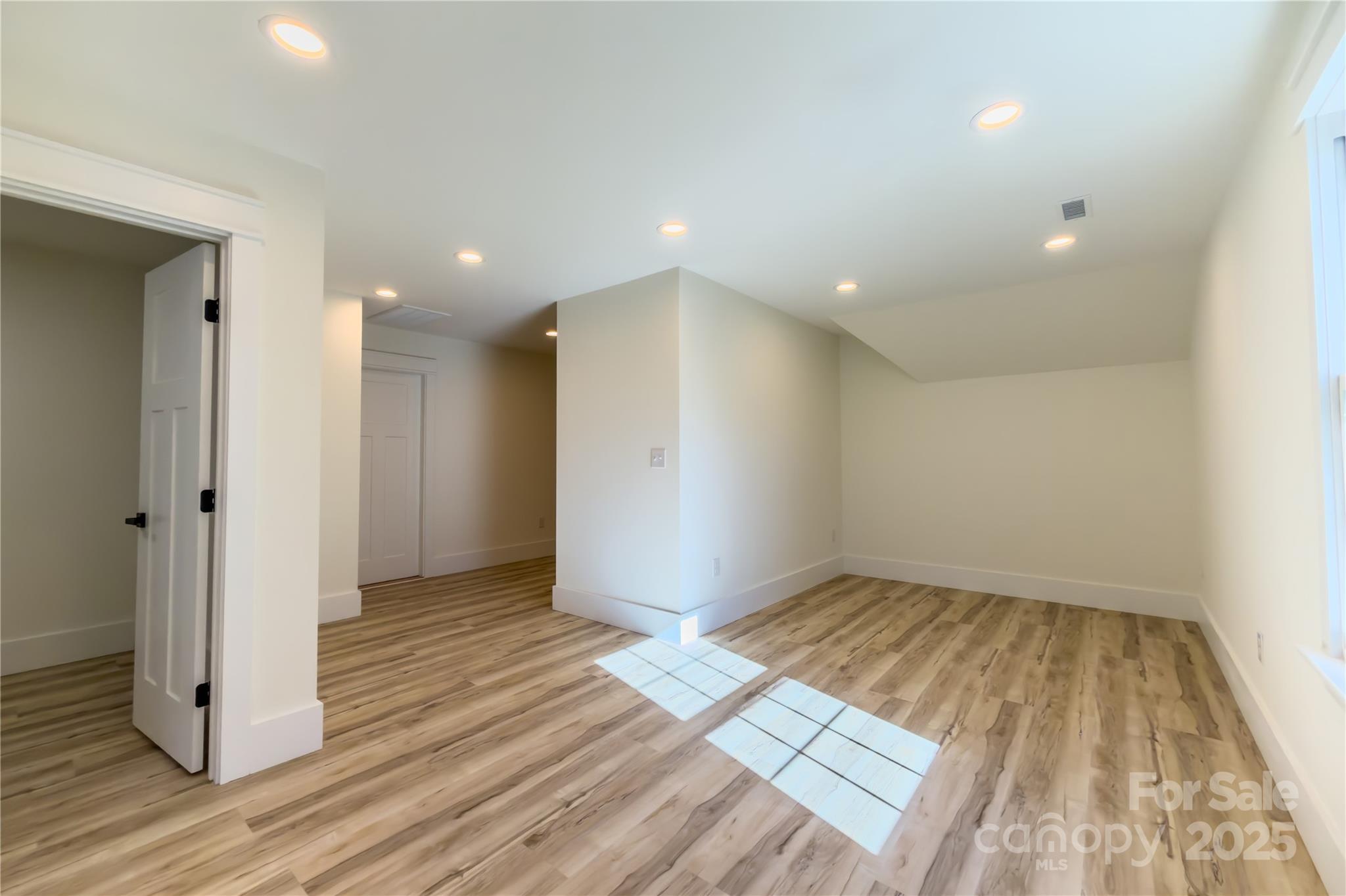 409 19th Ave Circle Northwest, Unit 12 Hickory, NC 28601 - Photo 37 of 46 a view of wooden floor and windows in a room