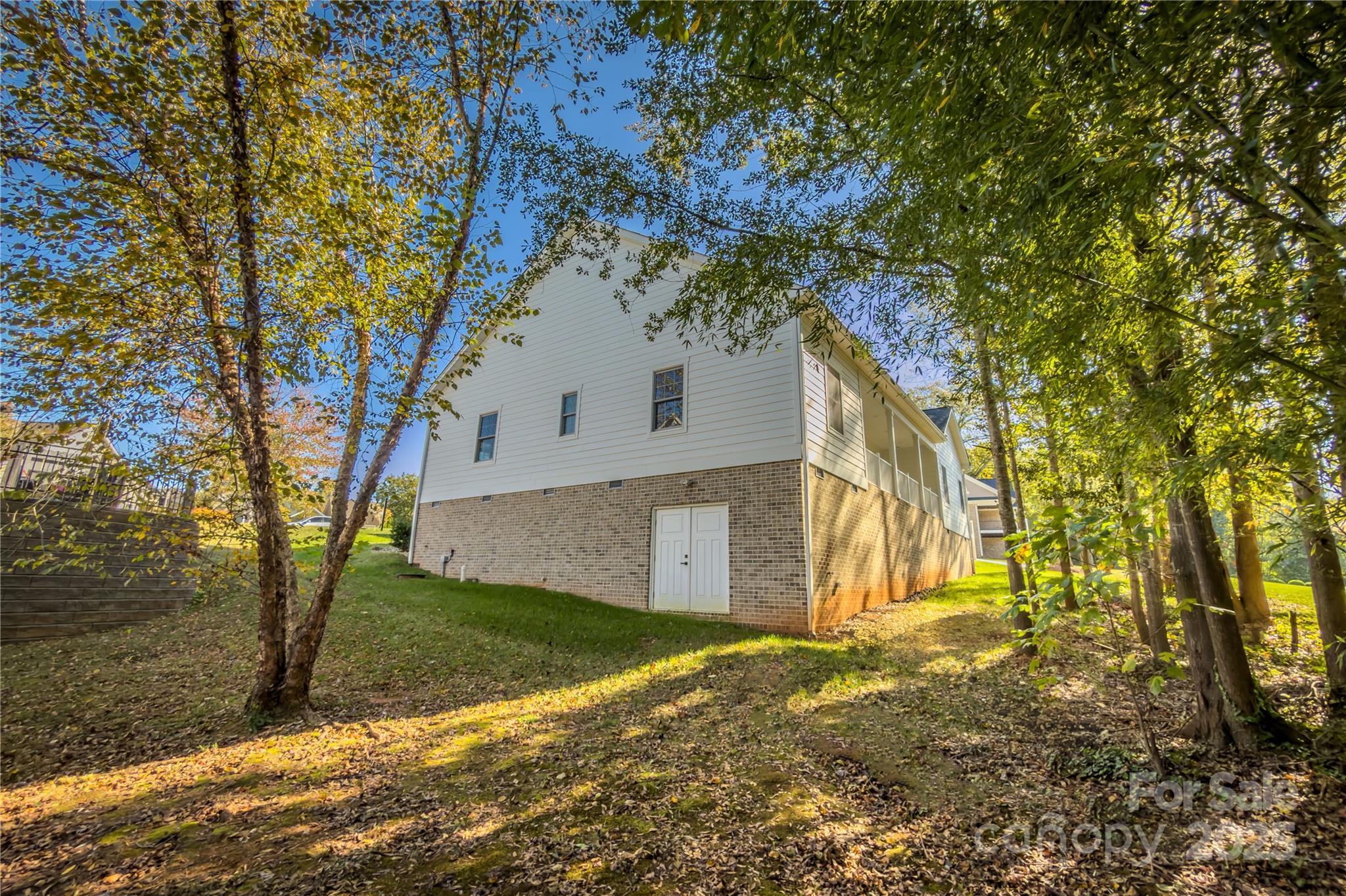 409 19th Ave Circle Northwest, Unit 12 Hickory, NC 28601 - Photo 42 of 46 a backyard of a house with lots of green space