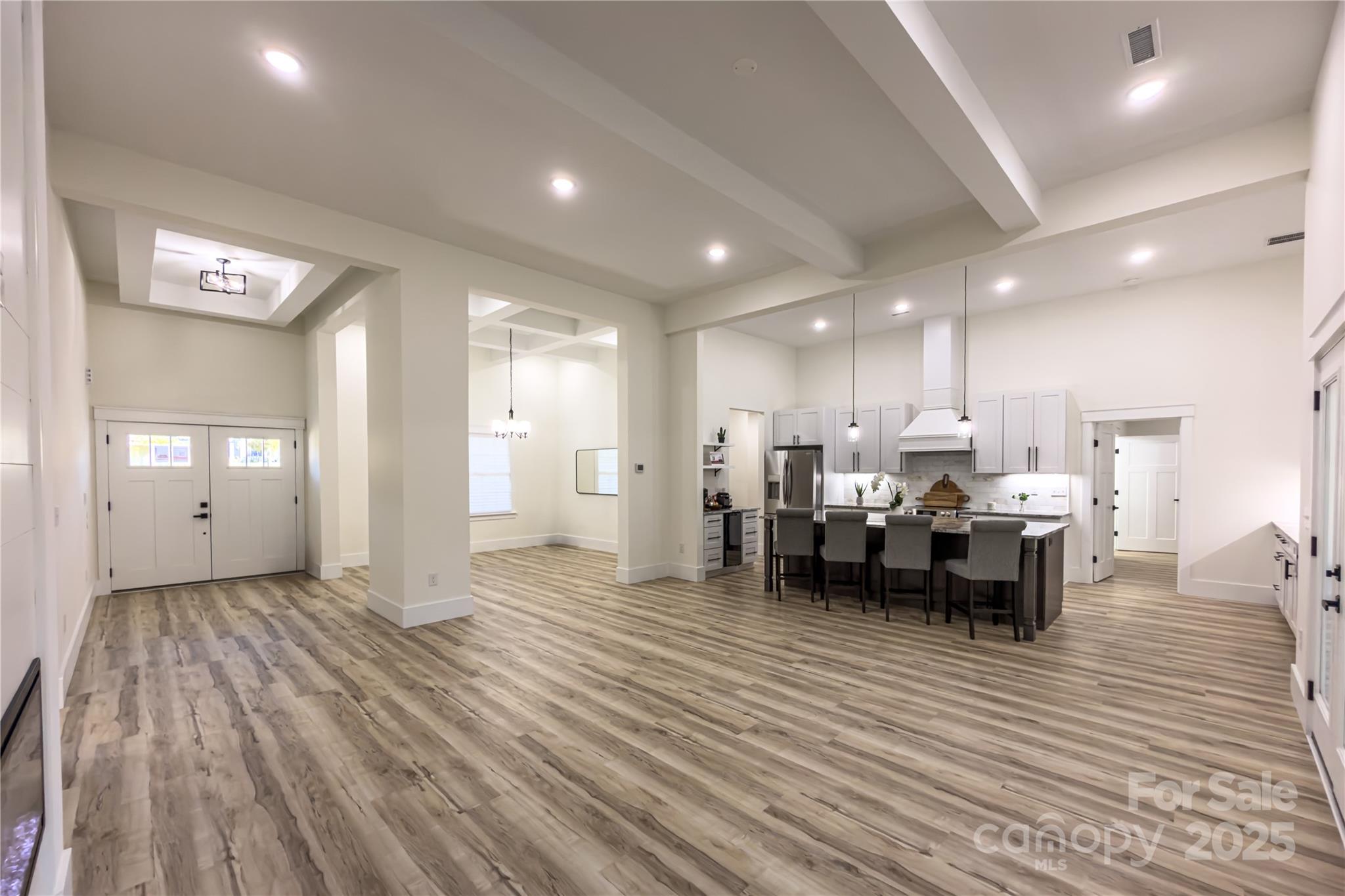 409 19th Ave Circle Northwest, Unit 12 Hickory, NC 28601 - Photo 7 of 46 a large room with lots of chairs and wooden floor