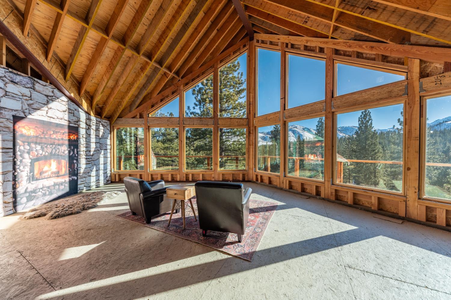 205 Raymond View Road Markleeville, CA 96120 - Photo 4 of 14 a living room with furniture and large windows