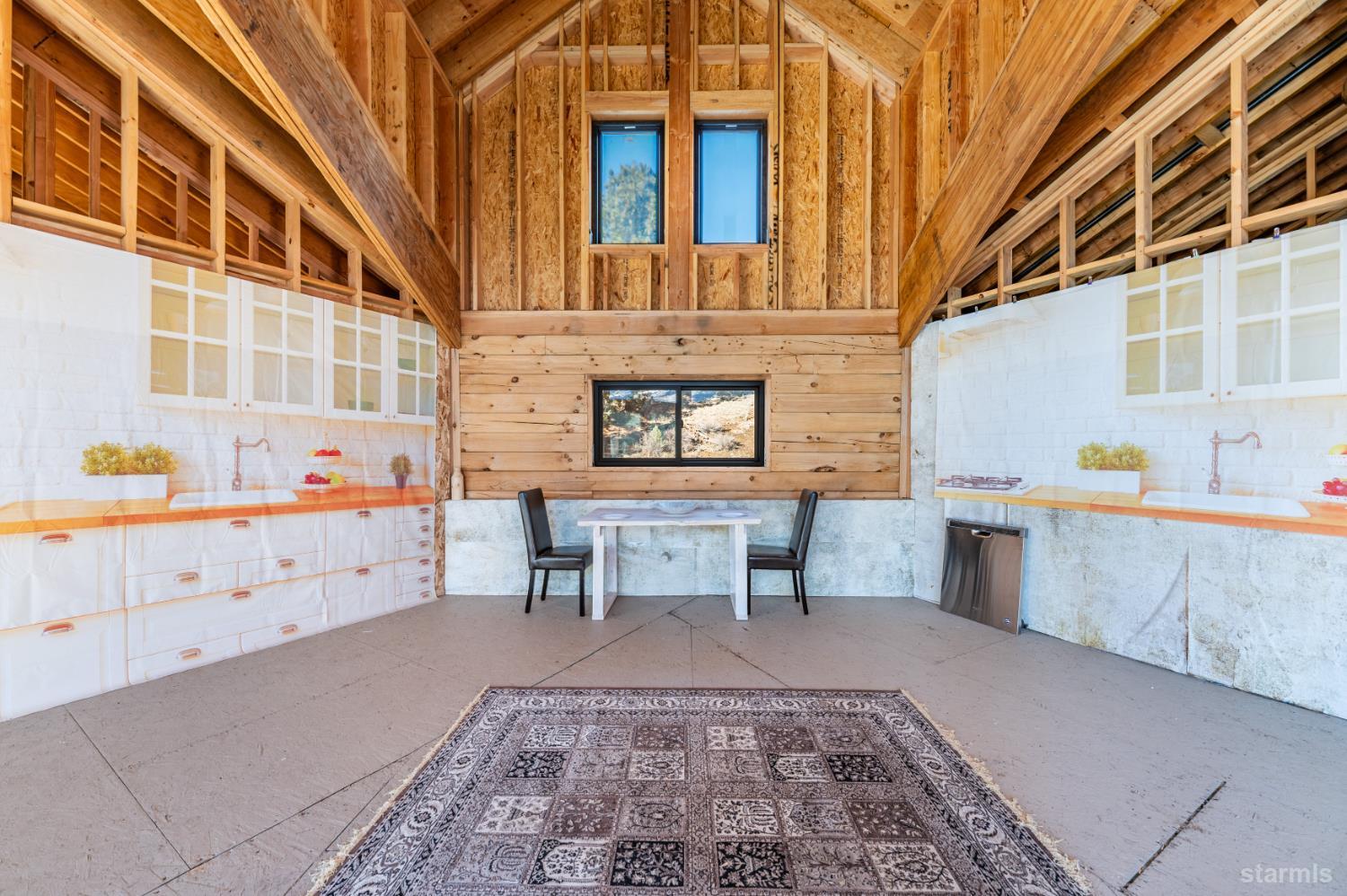 205 Raymond View Road Markleeville, CA 96120 - Photo 8 of 14 a view of a chairs and a table in the patio