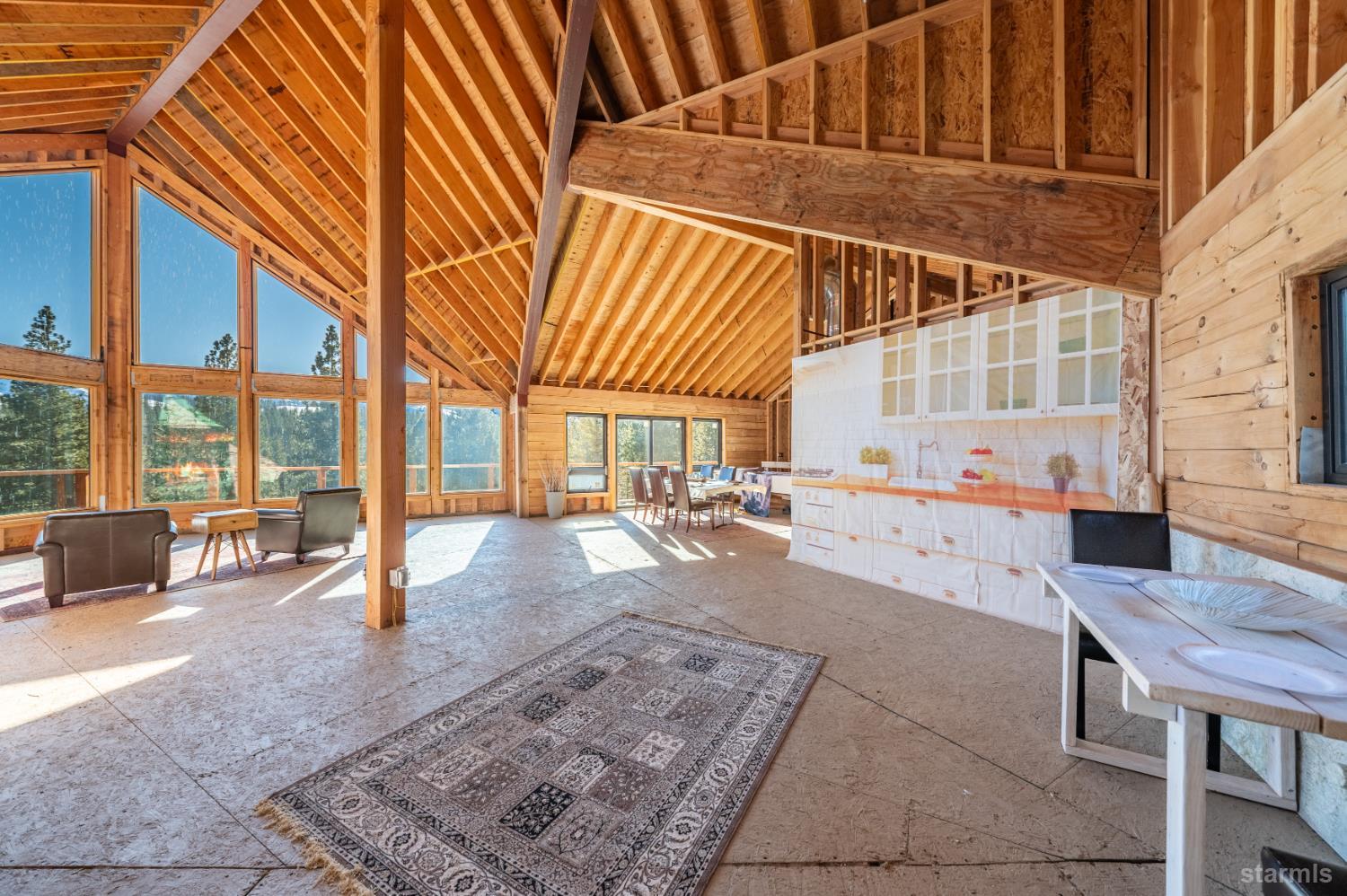 205 Raymond View Road Markleeville, CA 96120 - Photo 9 of 14 a view of a house with backyard porch and sitting area