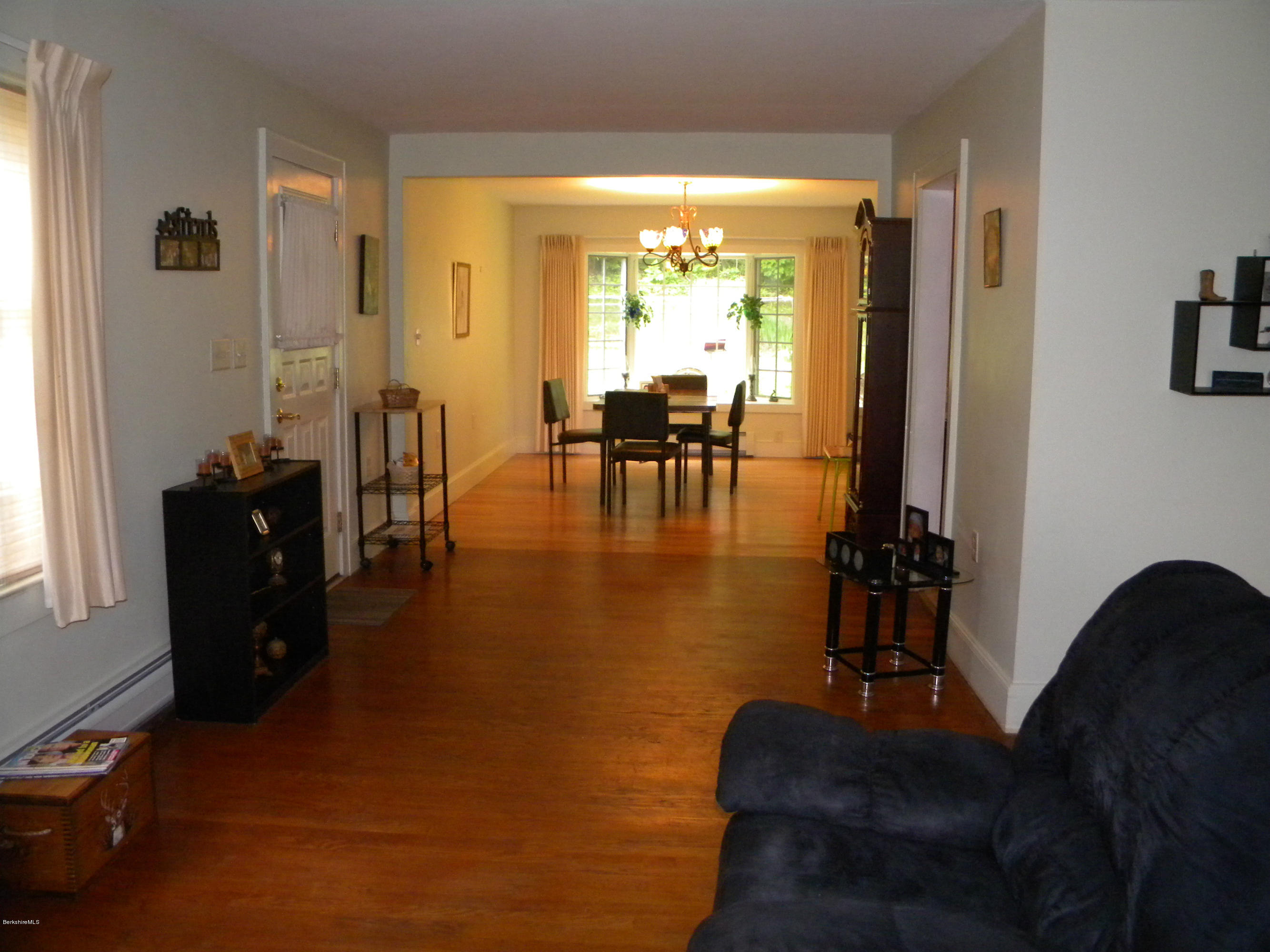3 Whitcomb Hill Road Florida, MA 01343 - Photo 4 of 14 a living room with furniture and a large window