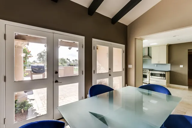 a view of a living room and dining room