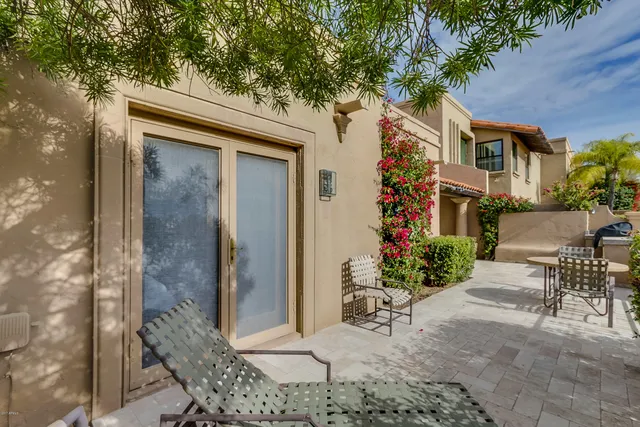 a view of a park with large trees