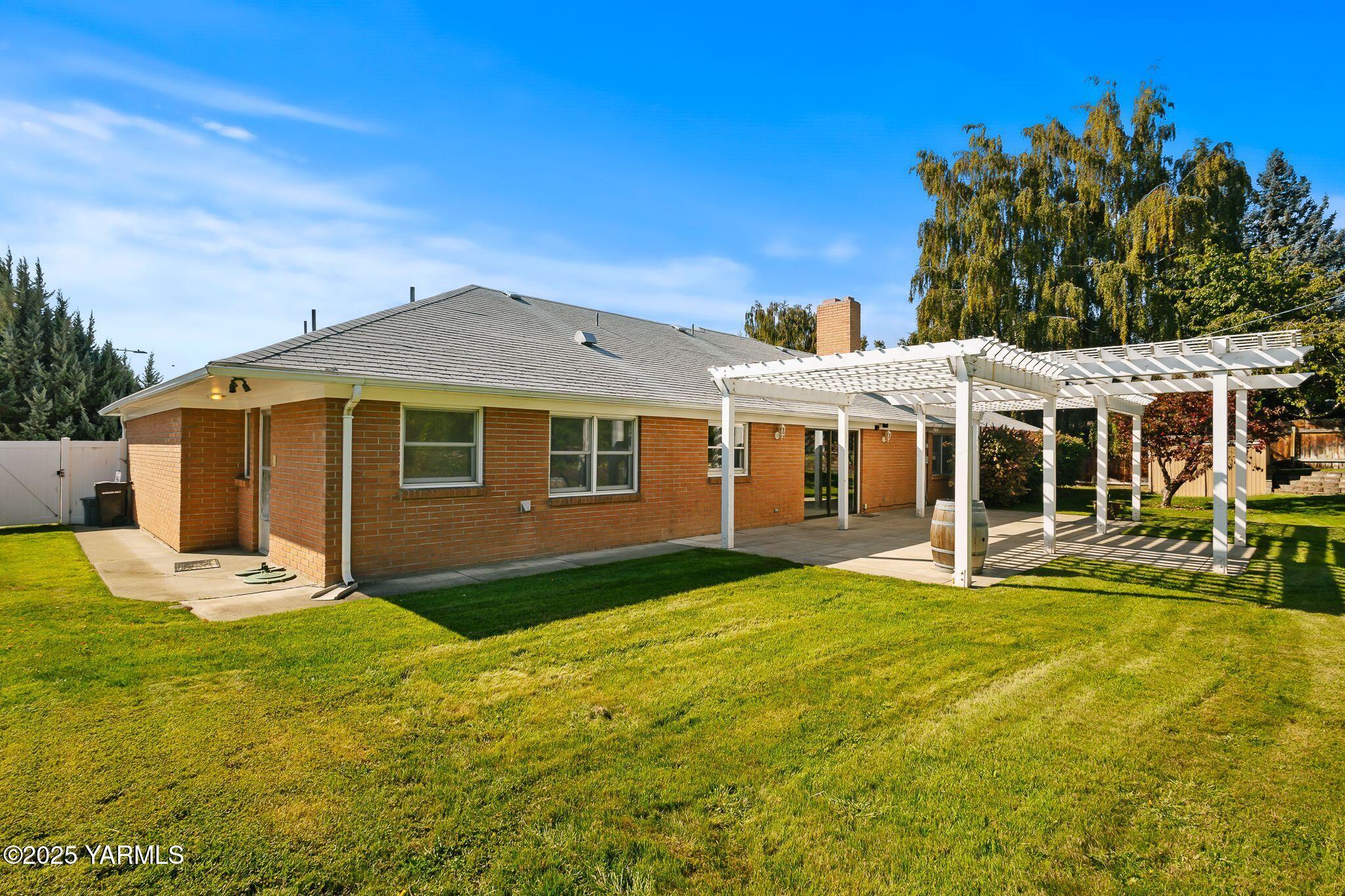 3609 Richey Road Yakima, WA 98902 - Photo 29 of 33 a view of a house with a yard