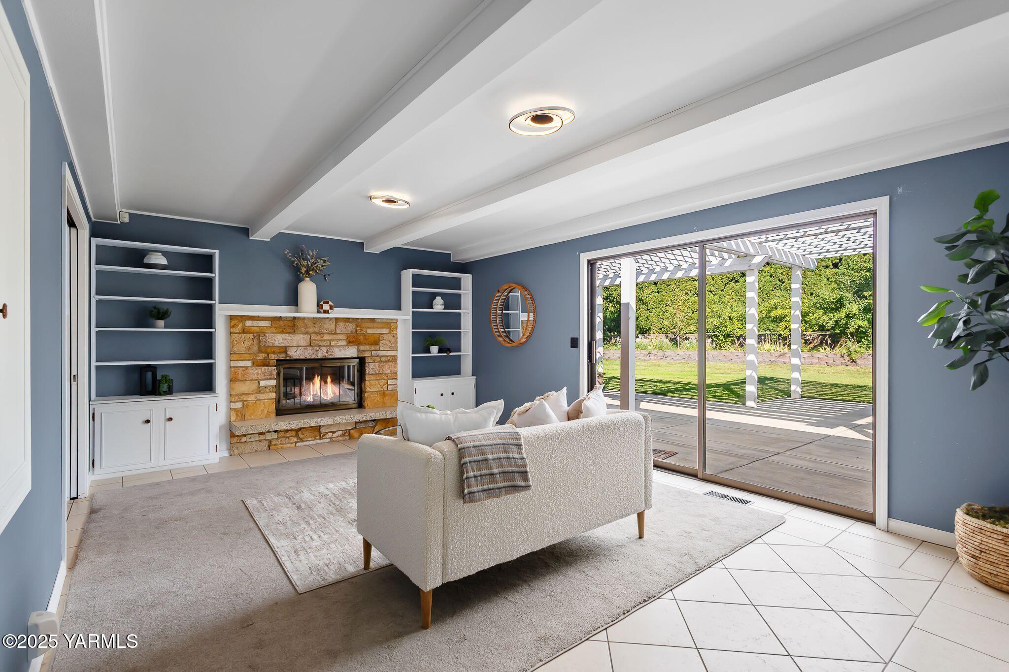 3609 Richey Road Yakima, WA 98902 - Photo 9 of 33 a living room with furniture and a fireplace