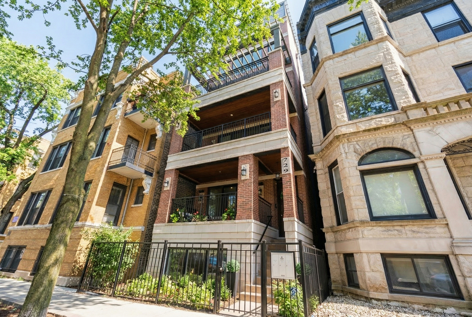 729 West Barry Avenue, Unit 1 Chicago, IL 60657 - Photo 1 of 34 a view of a building with a door