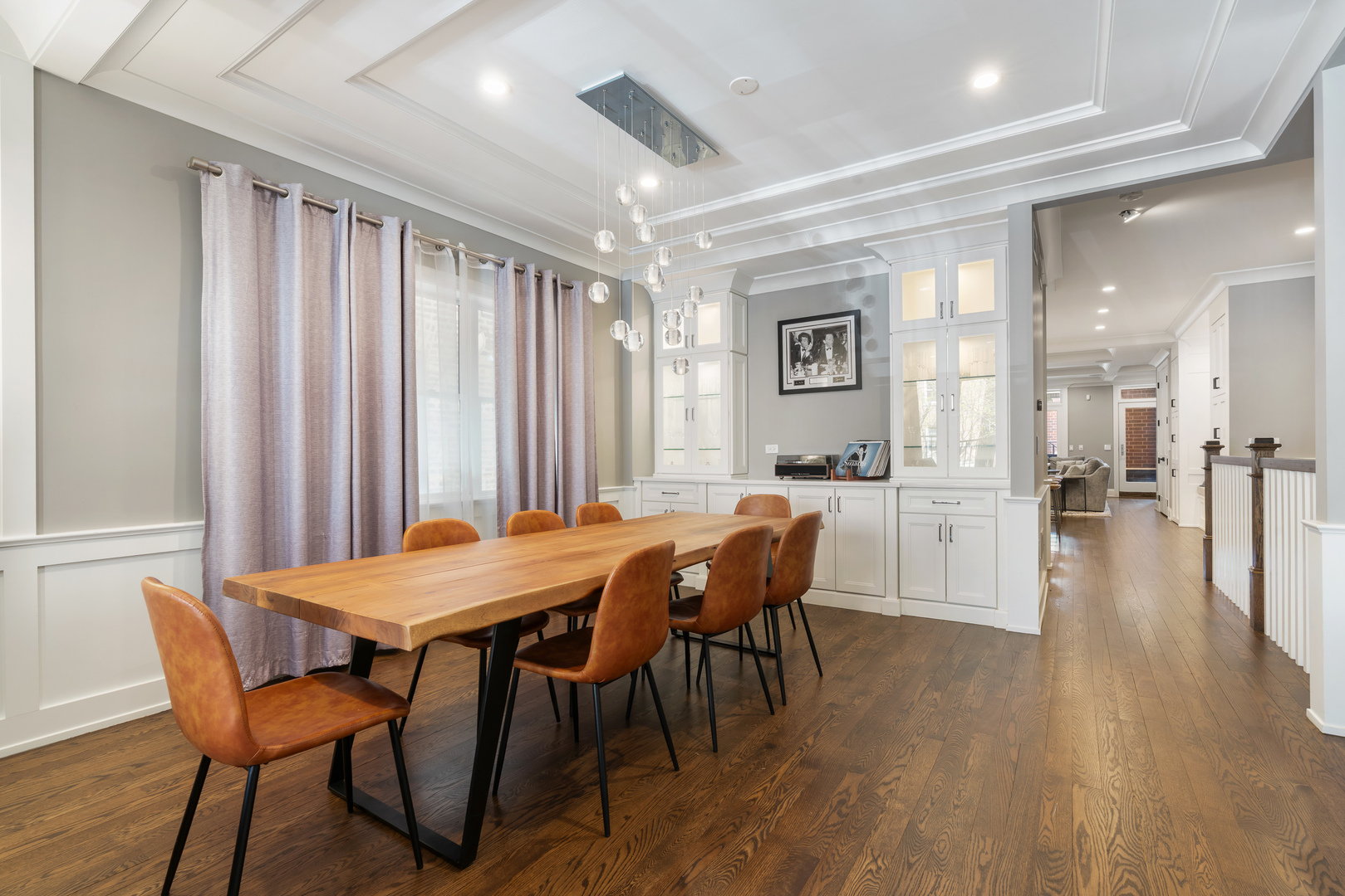729 West Barry Avenue, Unit 1 Chicago, IL 60657 - Photo 3 of 34 a view of a dining room with furniture and wooden floor