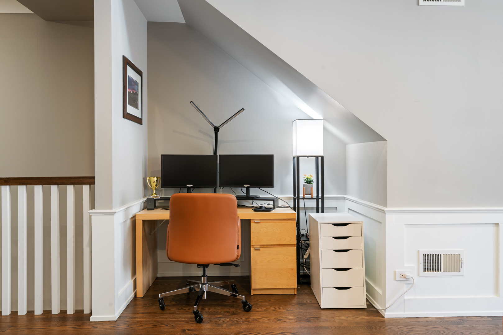 729 West Barry Avenue, Unit 1 Chicago, IL 60657 - Photo 5 of 34 a workspace with furniture and flat screen tv