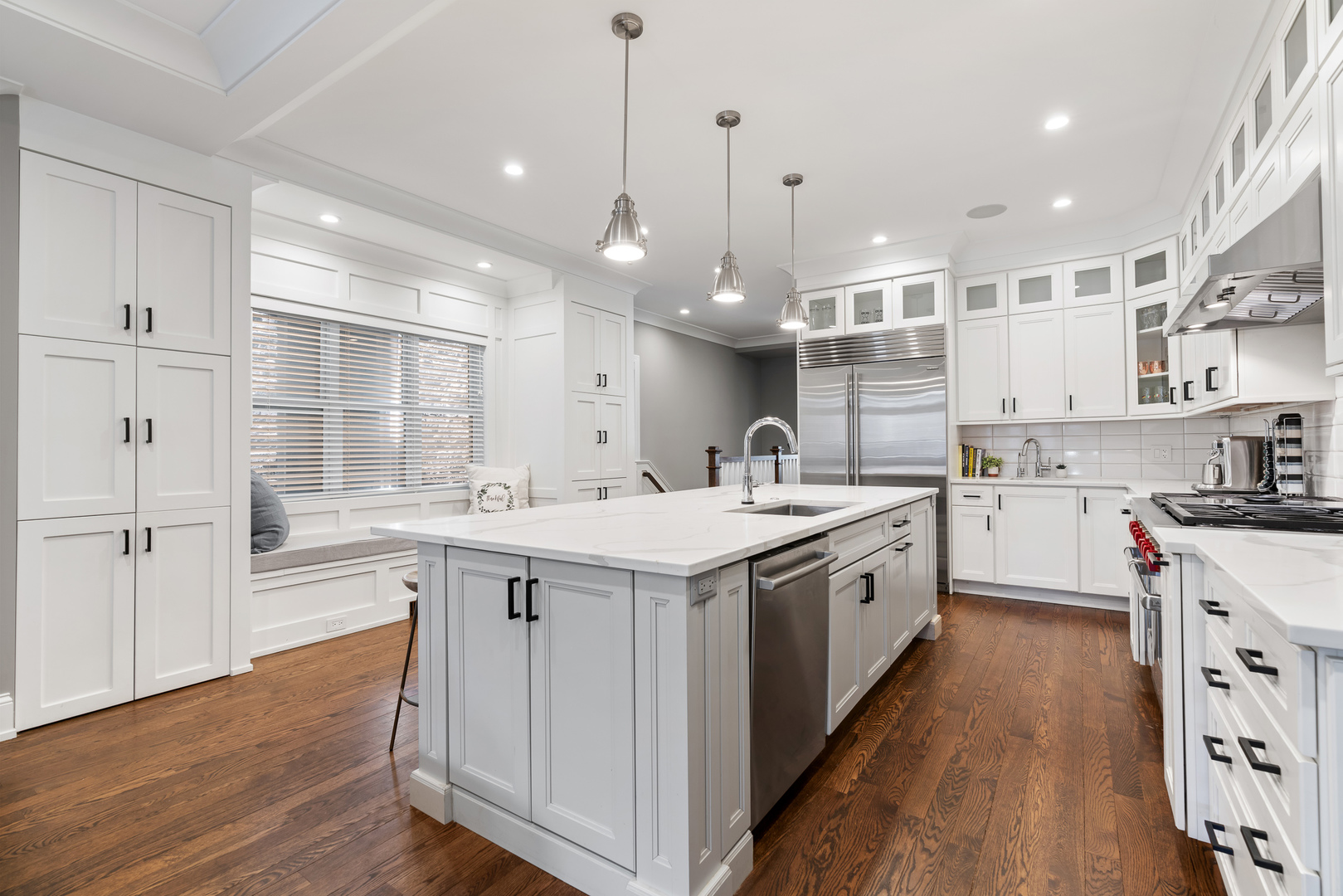 729 West Barry Avenue, Unit 1 Chicago, IL 60657 - Photo 9 of 34 a kitchen with stainless steel appliances granite countertop a sink and cabinets