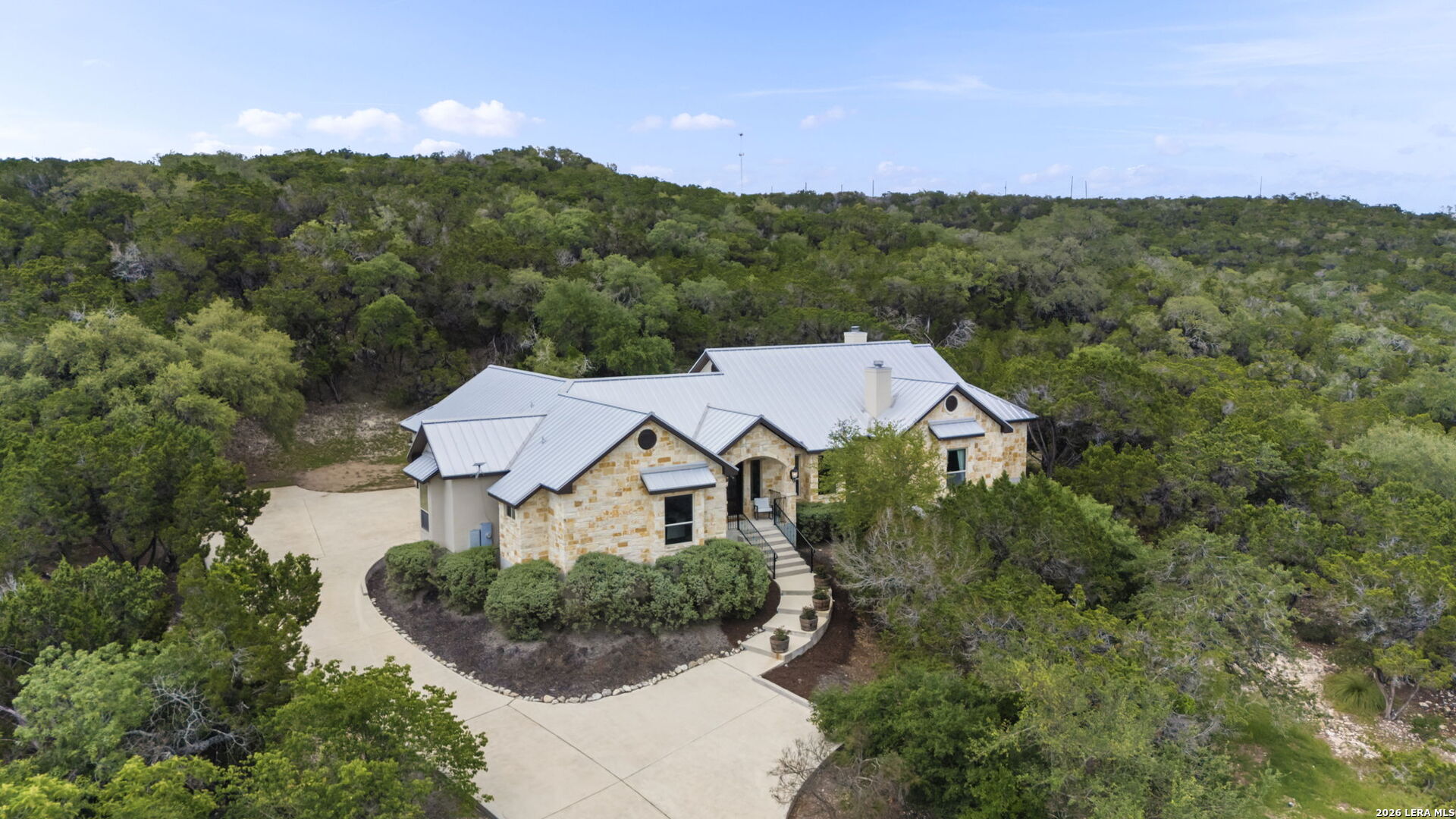 786 Shepherd's Crook Helotes, TX 78023 - Photo 1 of 36 a view of a house with a yard and street