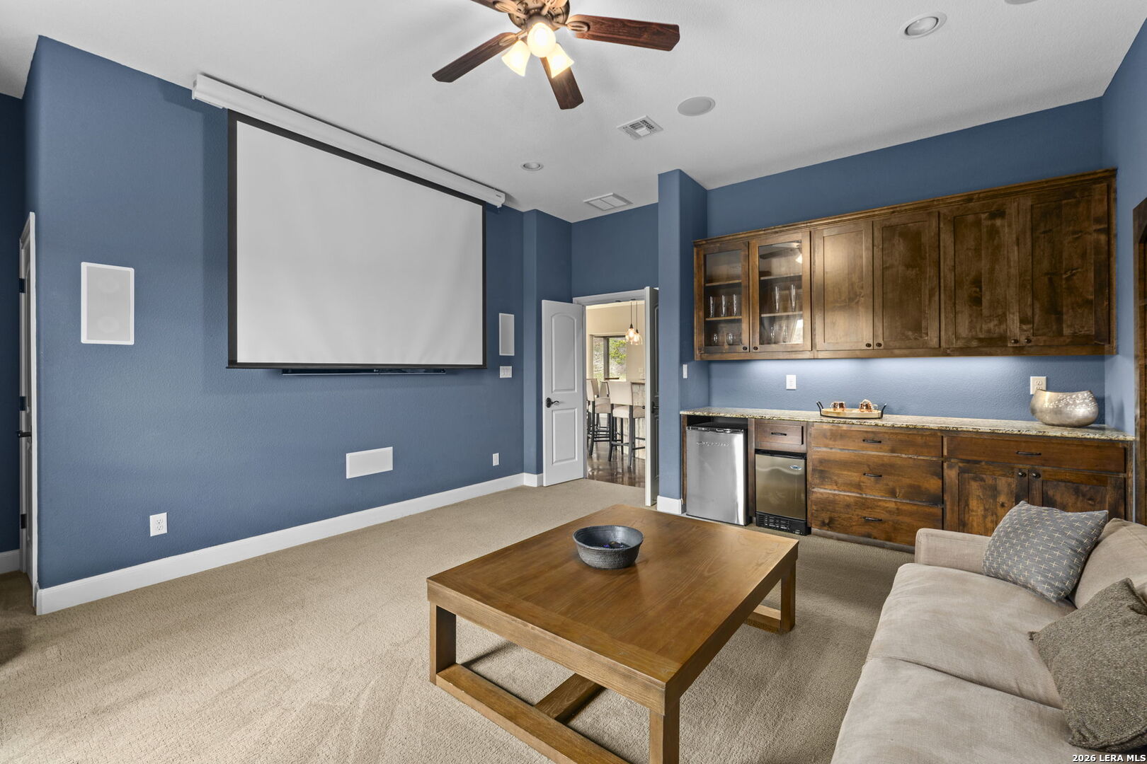 786 Shepherd's Crook Helotes, TX 78023 - Photo 12 of 36 a living room with a couch and a flat screen tv