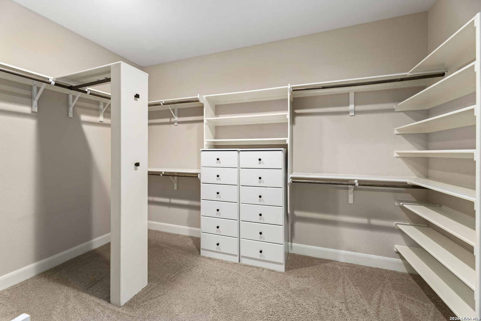786 Shepherd's Crook Helotes, TX 78023 - Photo 19 of 36 a view of walk in closet with empty racks