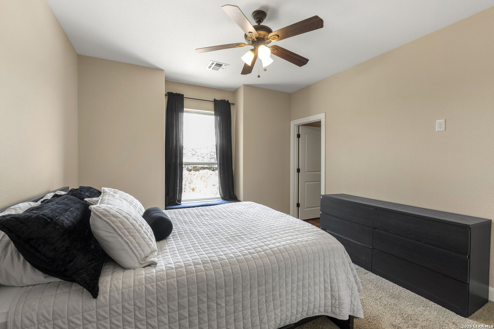 786 Shepherd's Crook Helotes, TX 78023 - Photo 20 of 36 a bedroom with a bed and a window