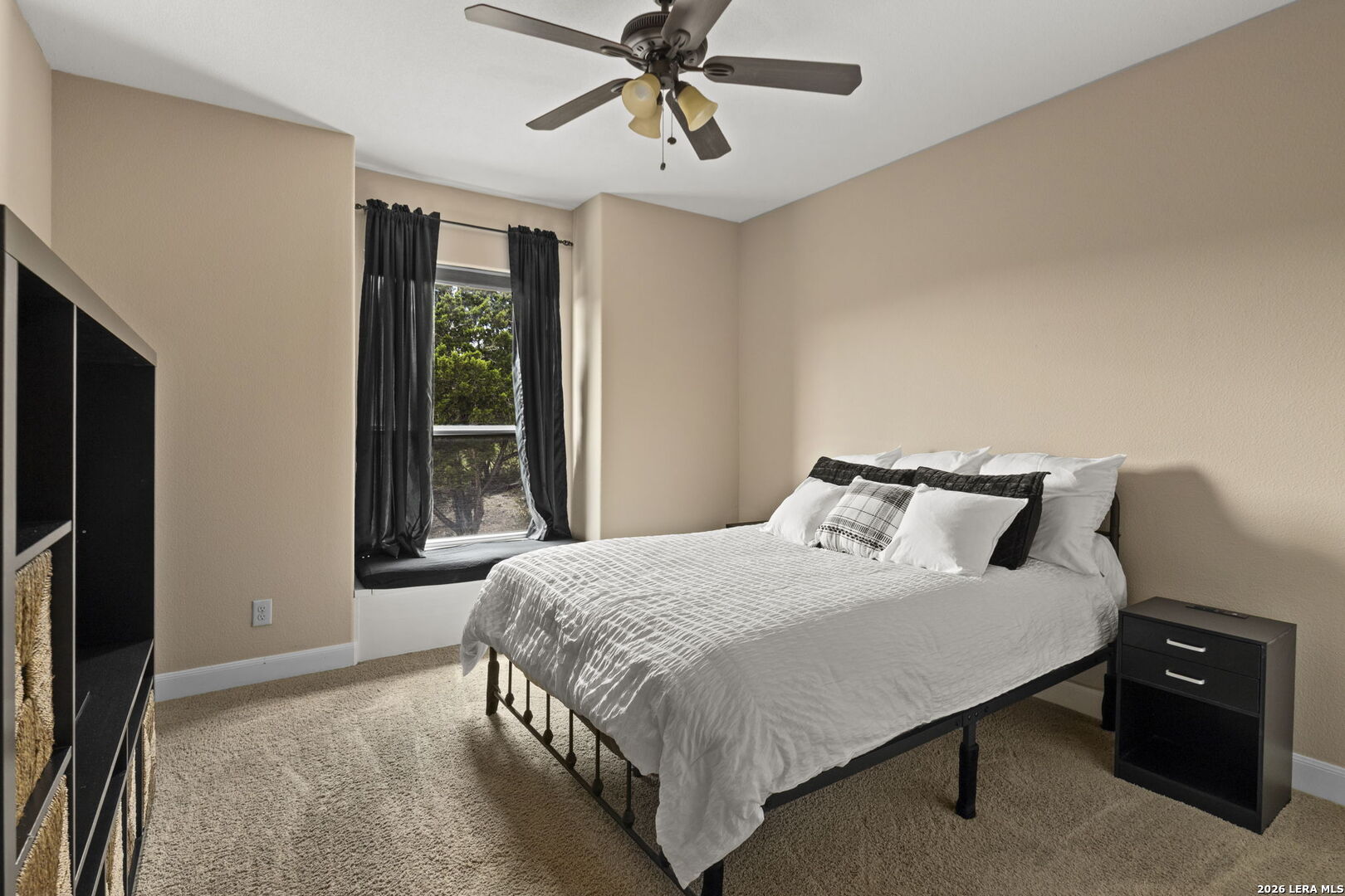 786 Shepherd's Crook Helotes, TX 78023 - Photo 22 of 36 a bedroom with a bed dresser and a window