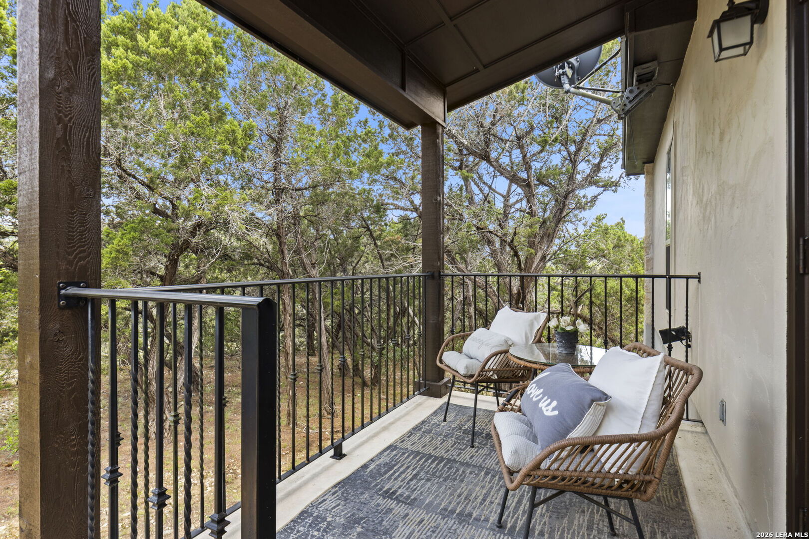 786 Shepherd's Crook Helotes, TX 78023 - Photo 26 of 36 a view of a chair and table in the balcony