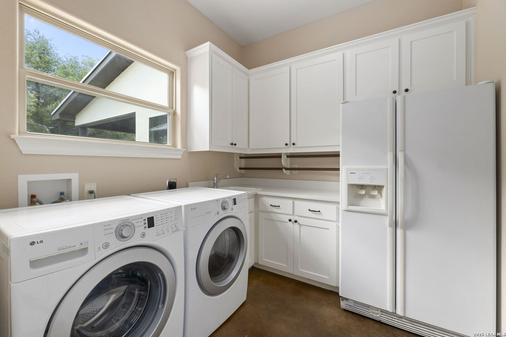 786 Shepherd's Crook Helotes, TX 78023 - Photo 31 of 36 a utility room with dryer and washer