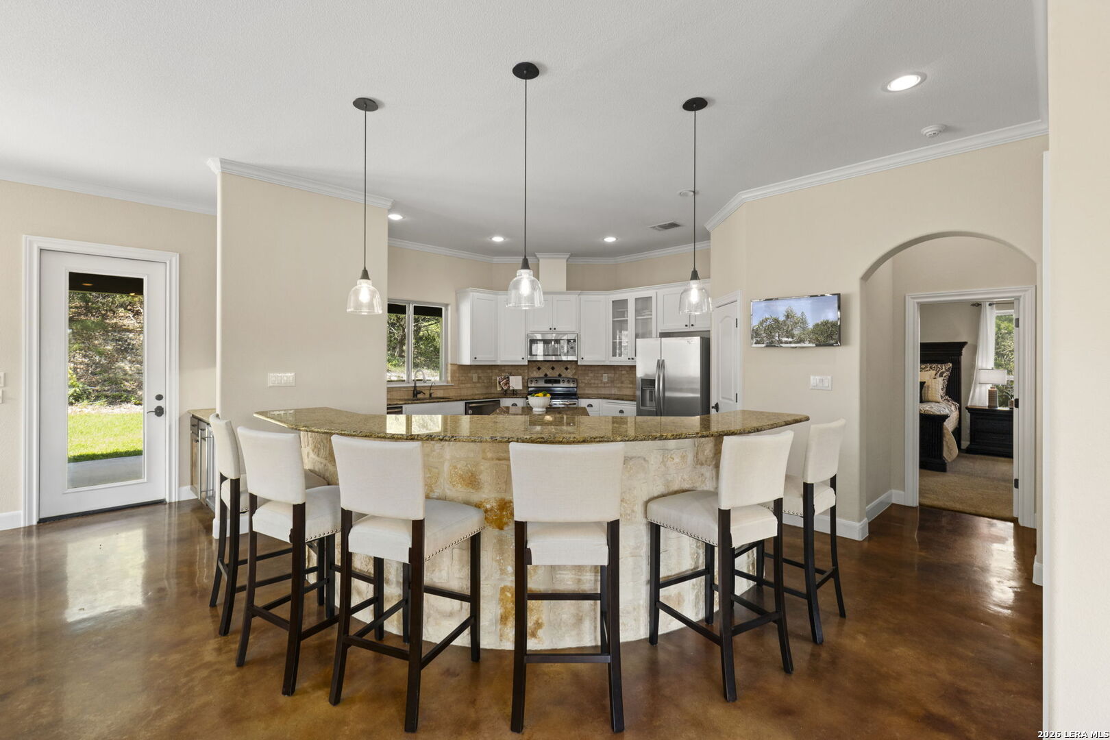786 Shepherd's Crook Helotes, TX 78023 - Photo 6 of 36 a dining room with stainless steel appliances kitchen island granite countertop a dining table chairs and view living room
