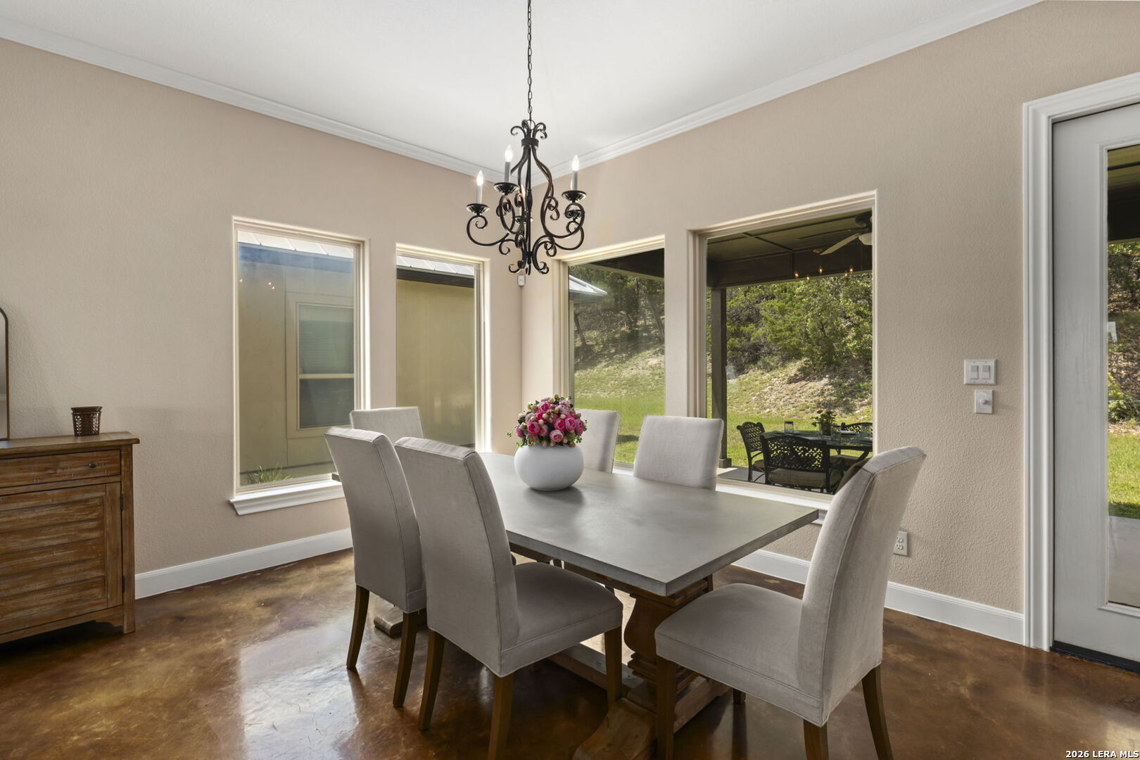 786 Shepherd's Crook Helotes, TX 78023 - Photo 10 of 36 a view of a dining room with furniture window and wooden floor