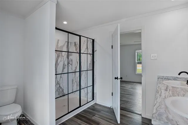 a view of entryway with wooden floor