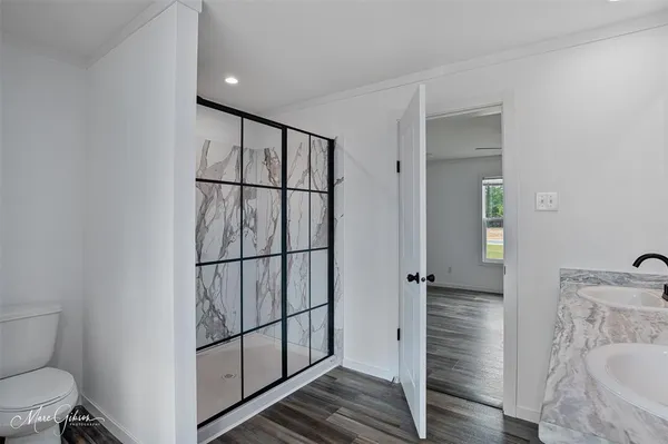 a view of entryway with wooden floor
