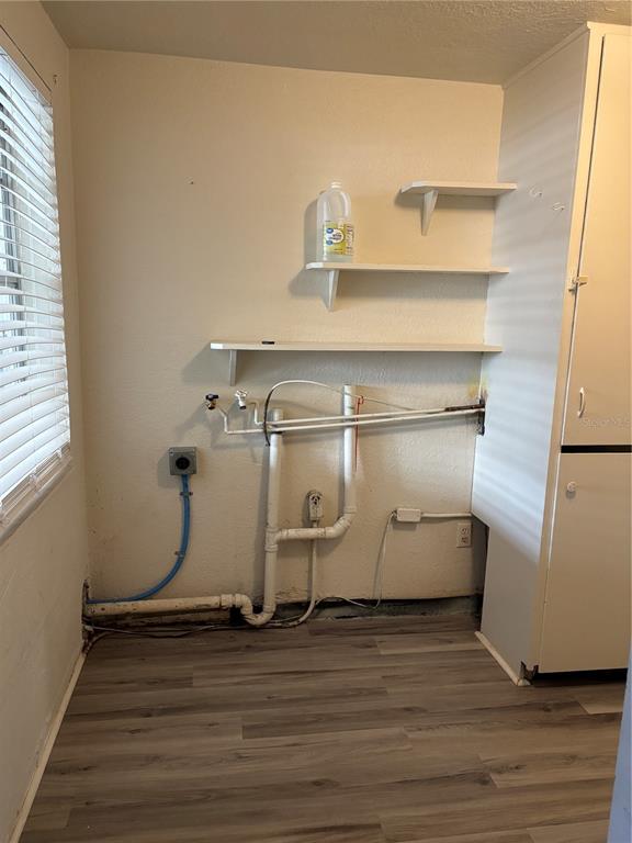 1102 Sunset Point Road, Unit 6 Clearwater, FL 33755 - Photo 27 of 31 a view of room with wooden floor